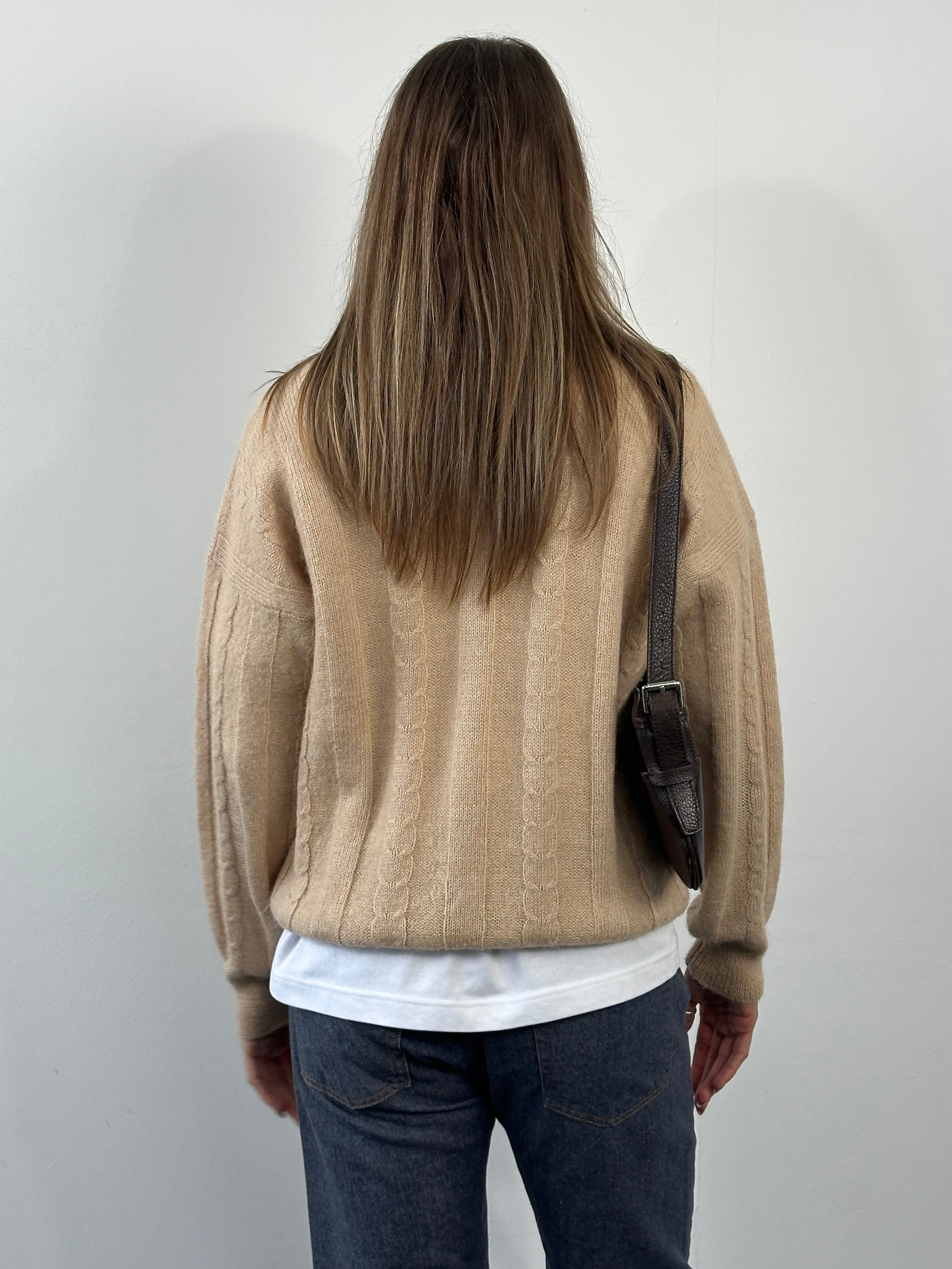 Vintage 1980s wool mohair knitted polo jumper in size M, featuring classic textured knit and a collared design.