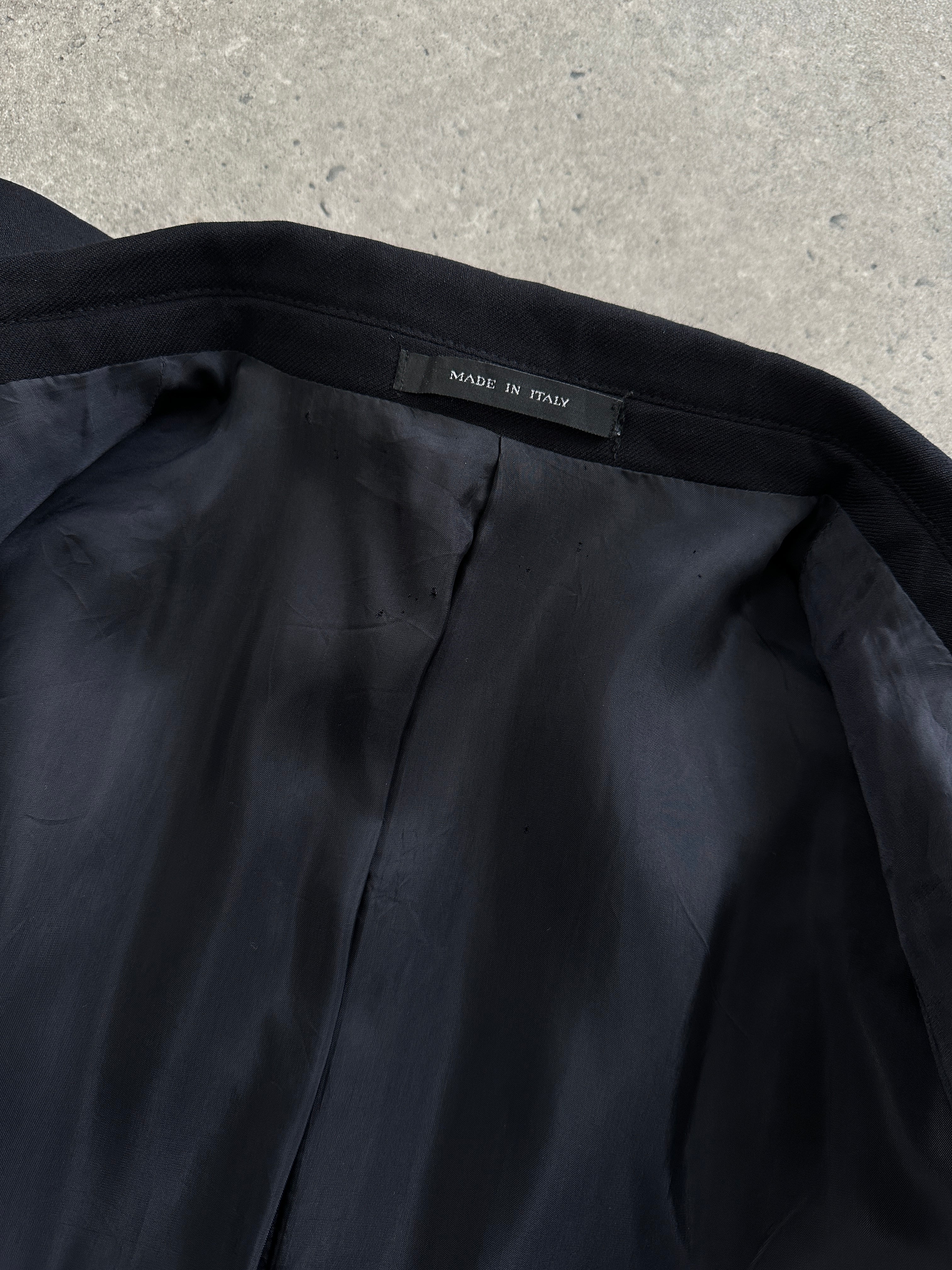 Emporio Armani wool single-breasted blazer in size M/L, tailored fit, classic design, dark color, displayed on a hanger.