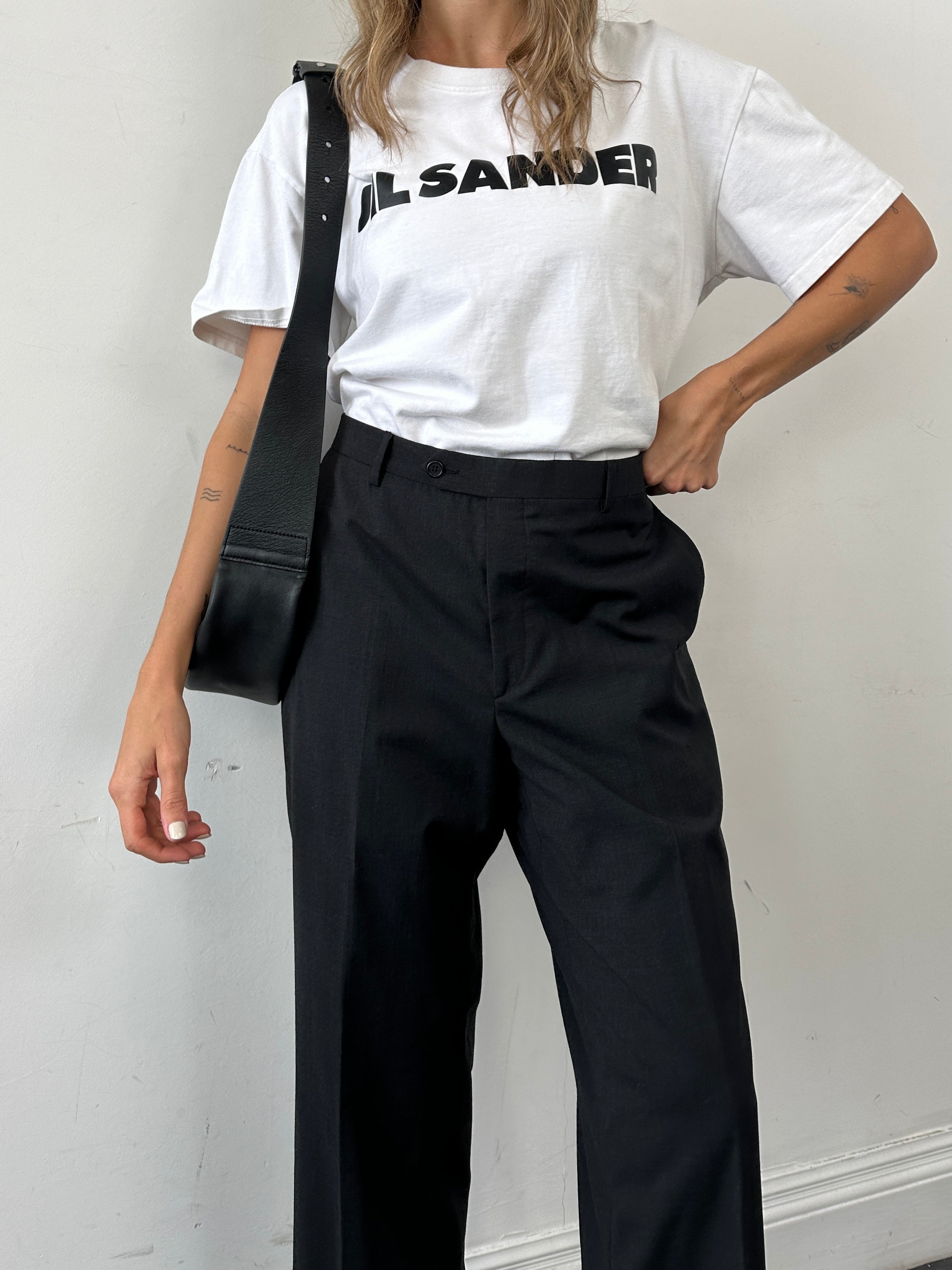 Vintage wool straight leg tailored trousers in W34, featuring classic fit and timeless design, shown on a neutral background.