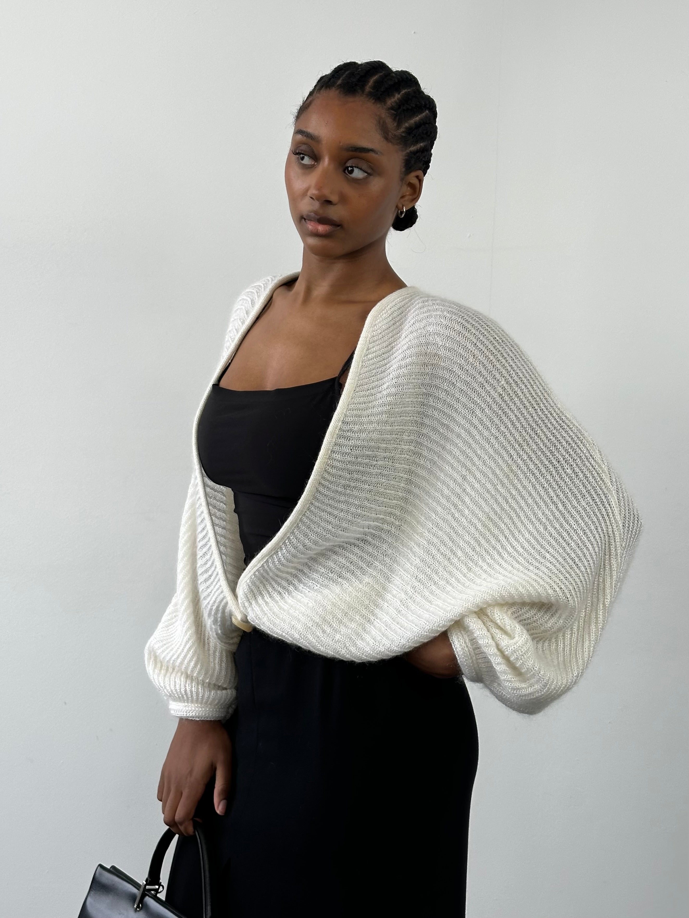 Vintage Italian 1990s mohair knitted cardigan, size M, featuring soft, textured fabric and classic design.