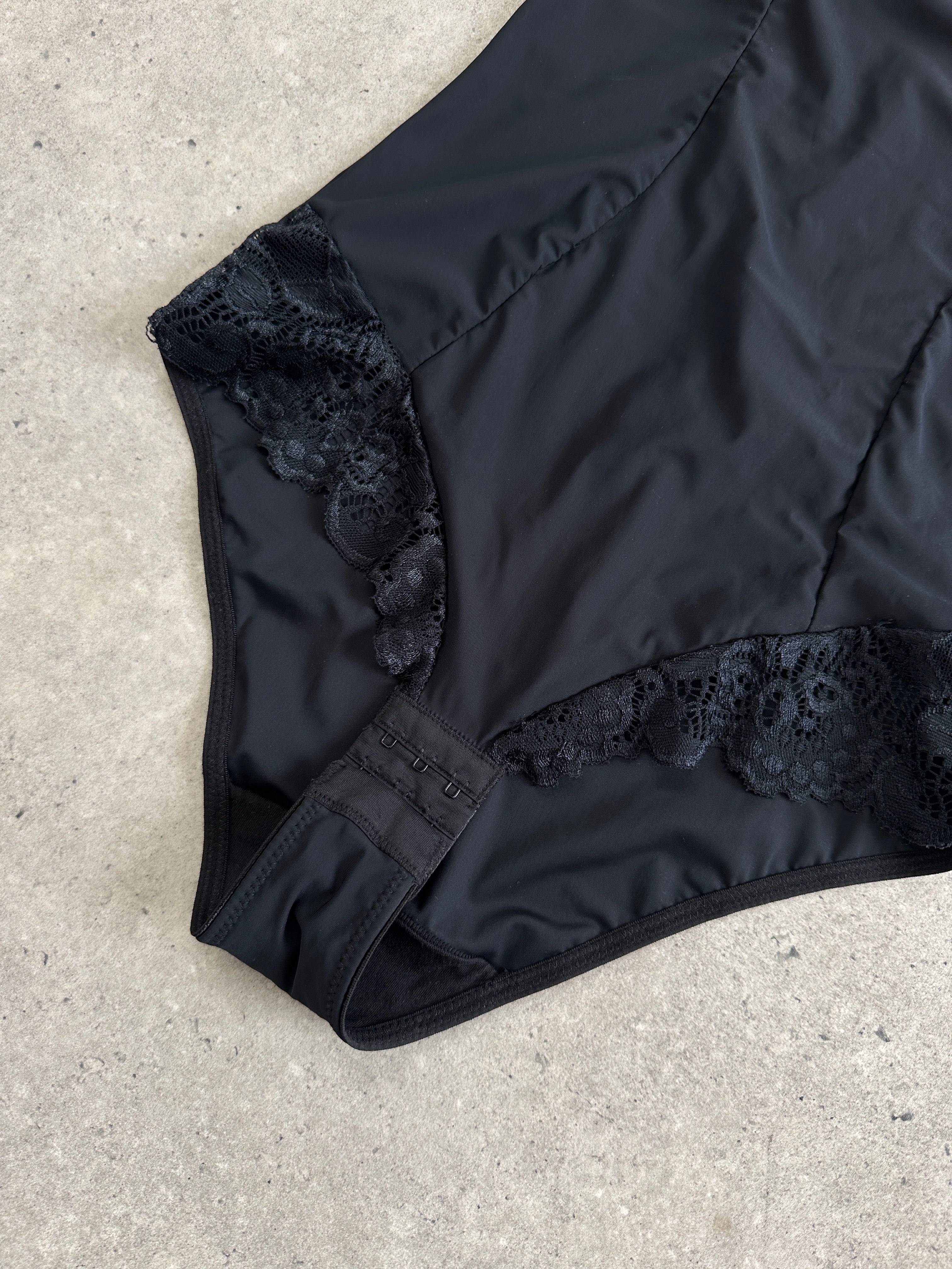 Vintage 2000s satin lace bodysuit top in size S with delicate lace details and smooth satin fabric, stylish and elegant.