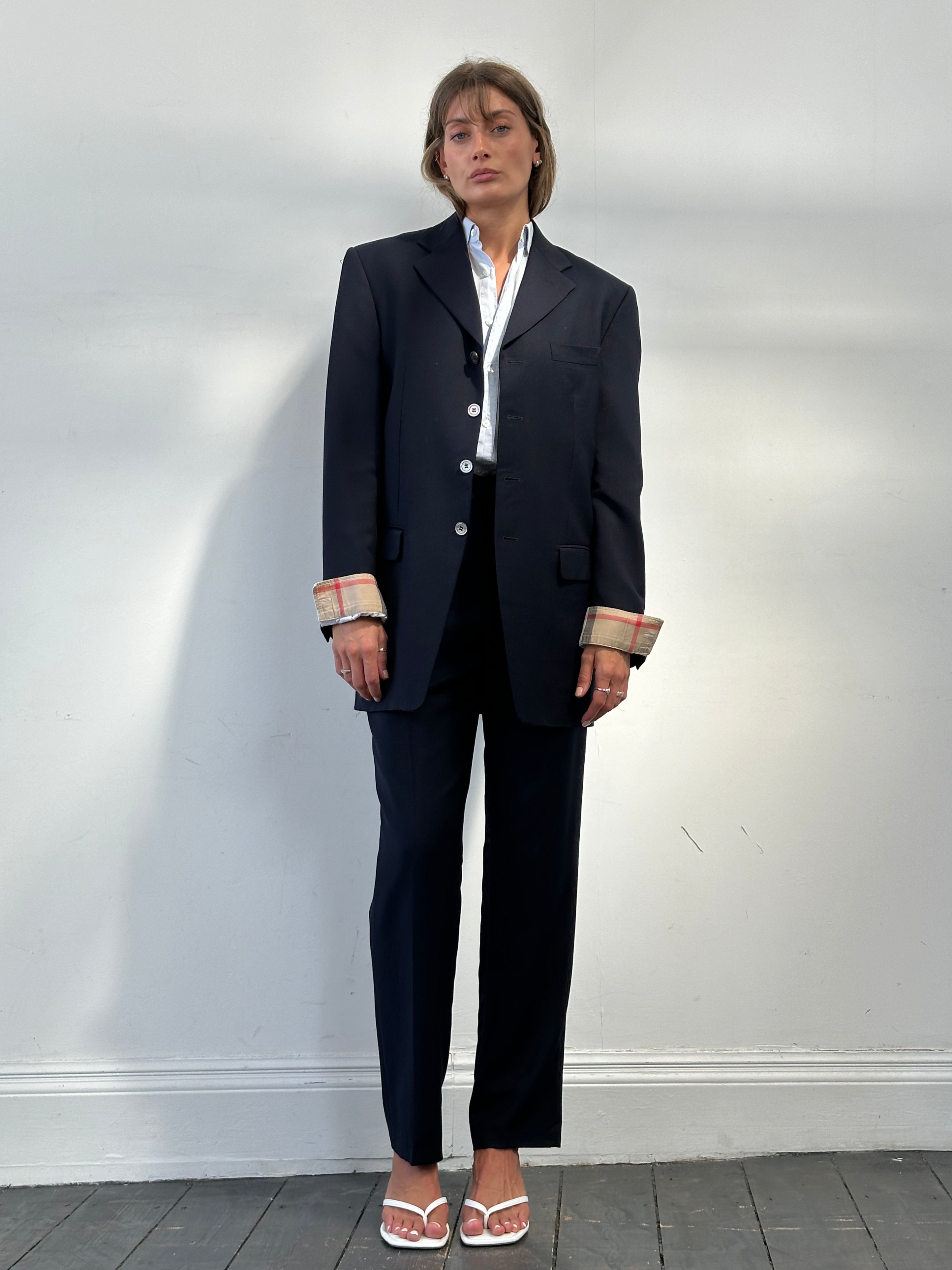 Yves Saint Laurent Virgin Wool Mohair jumpsuit in 38R/W28, single-breasted design, tailored fit, with lapel collar and front buttons.
