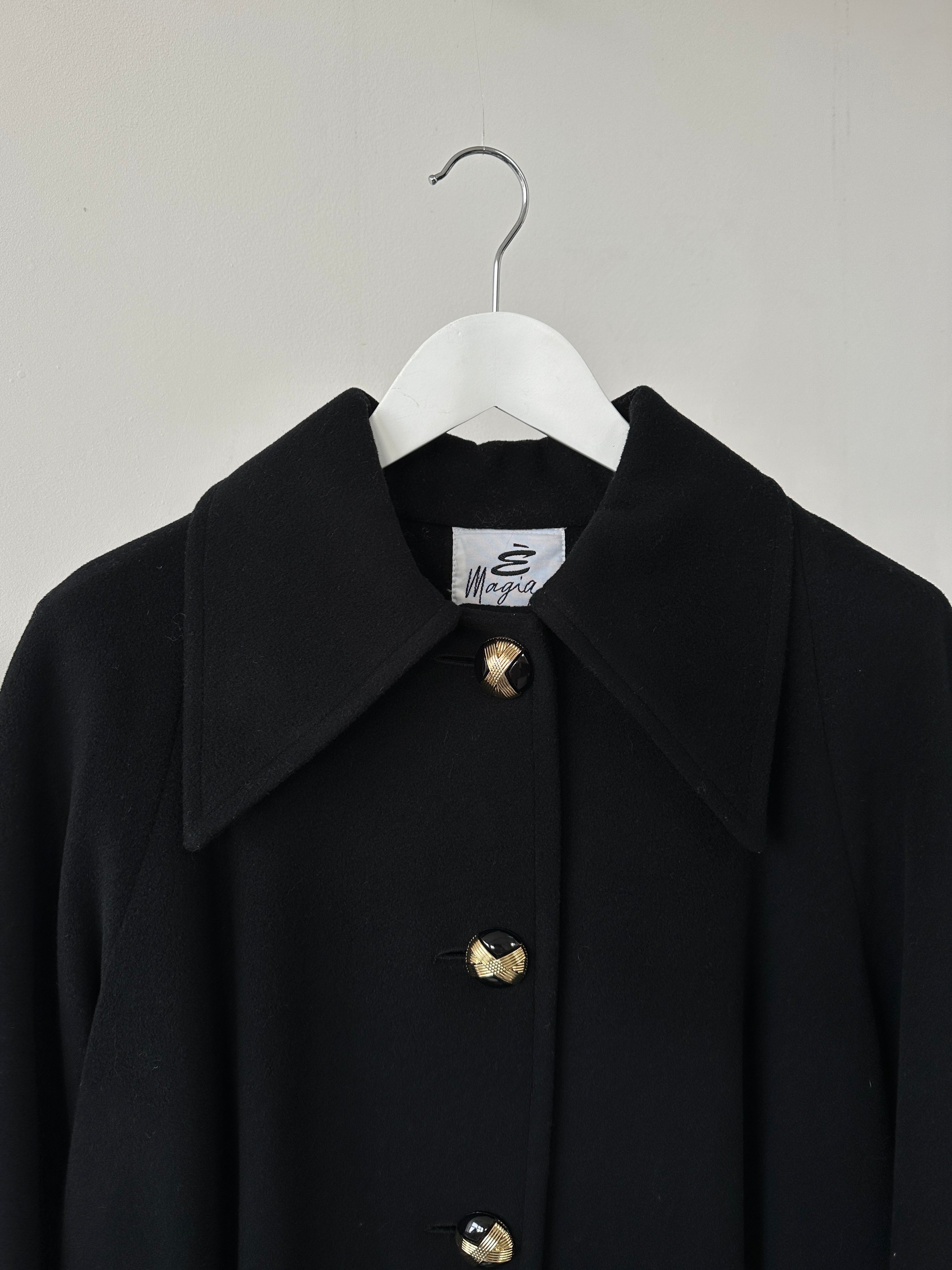 Vintage Italian wool A-line coat with dagger collar, in classic style, shown in size S/M. Elegant and timeless outerwear piece.