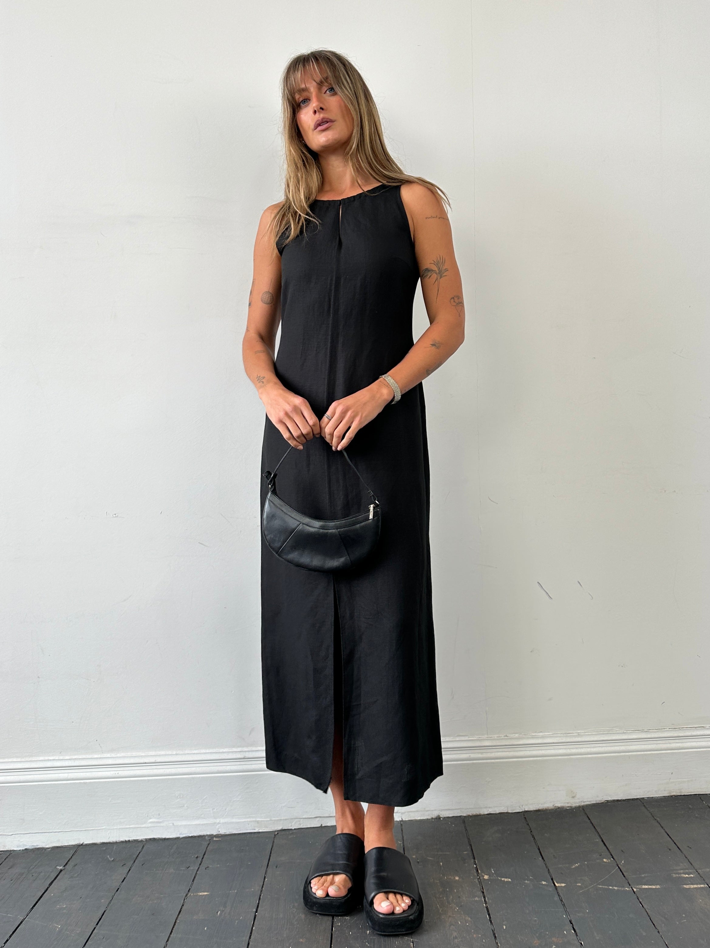 Marella linen floor-length dress in size M, featuring a flowing design and elegant details, perfect for summer or casual occasions.