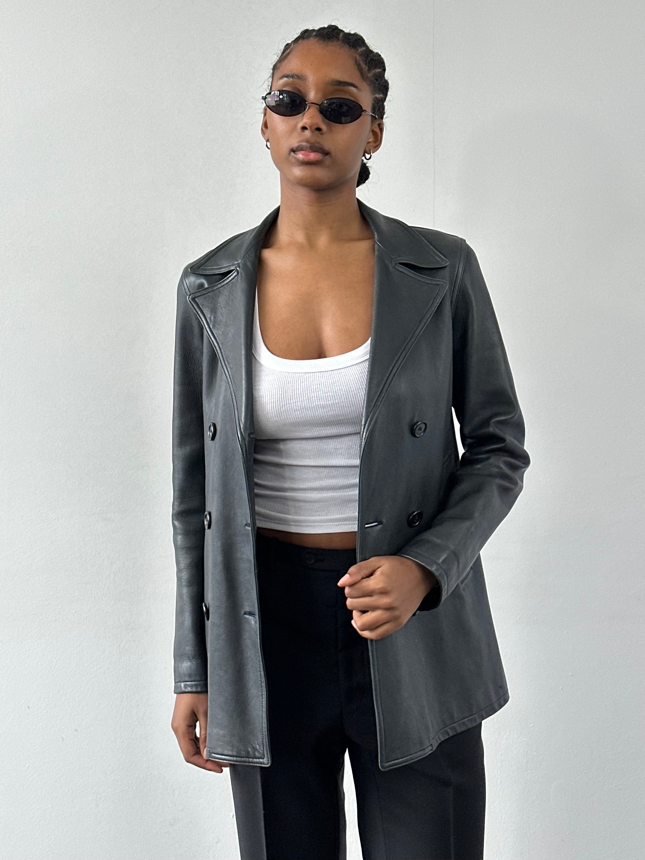 Jaeger 2000s double-breasted leather jacket in black, men's S/M size, featuring classic design and button details.
