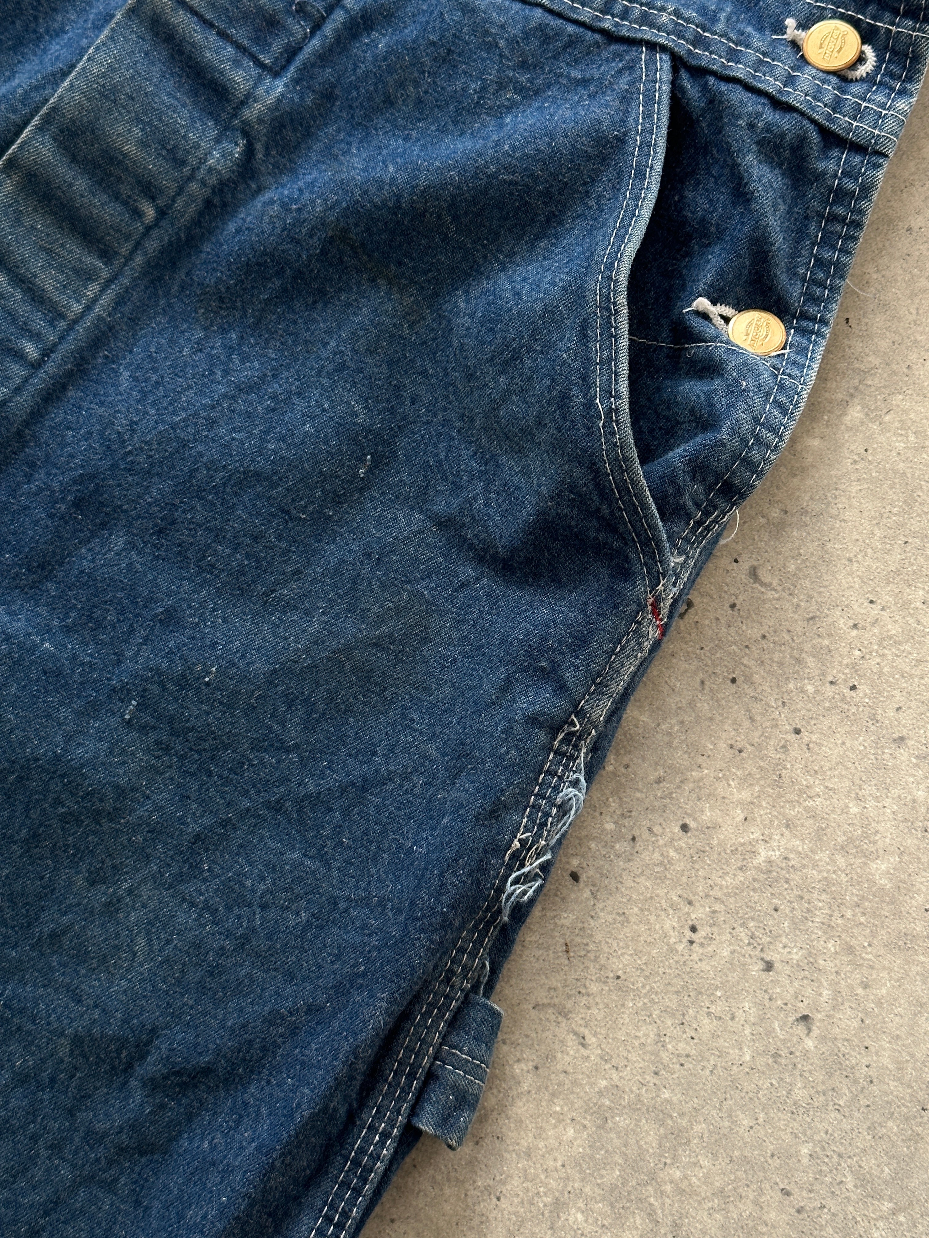 Dickies pure cotton denim dungarees in XS/S size, featuring classic blue fabric and adjustable shoulder straps.