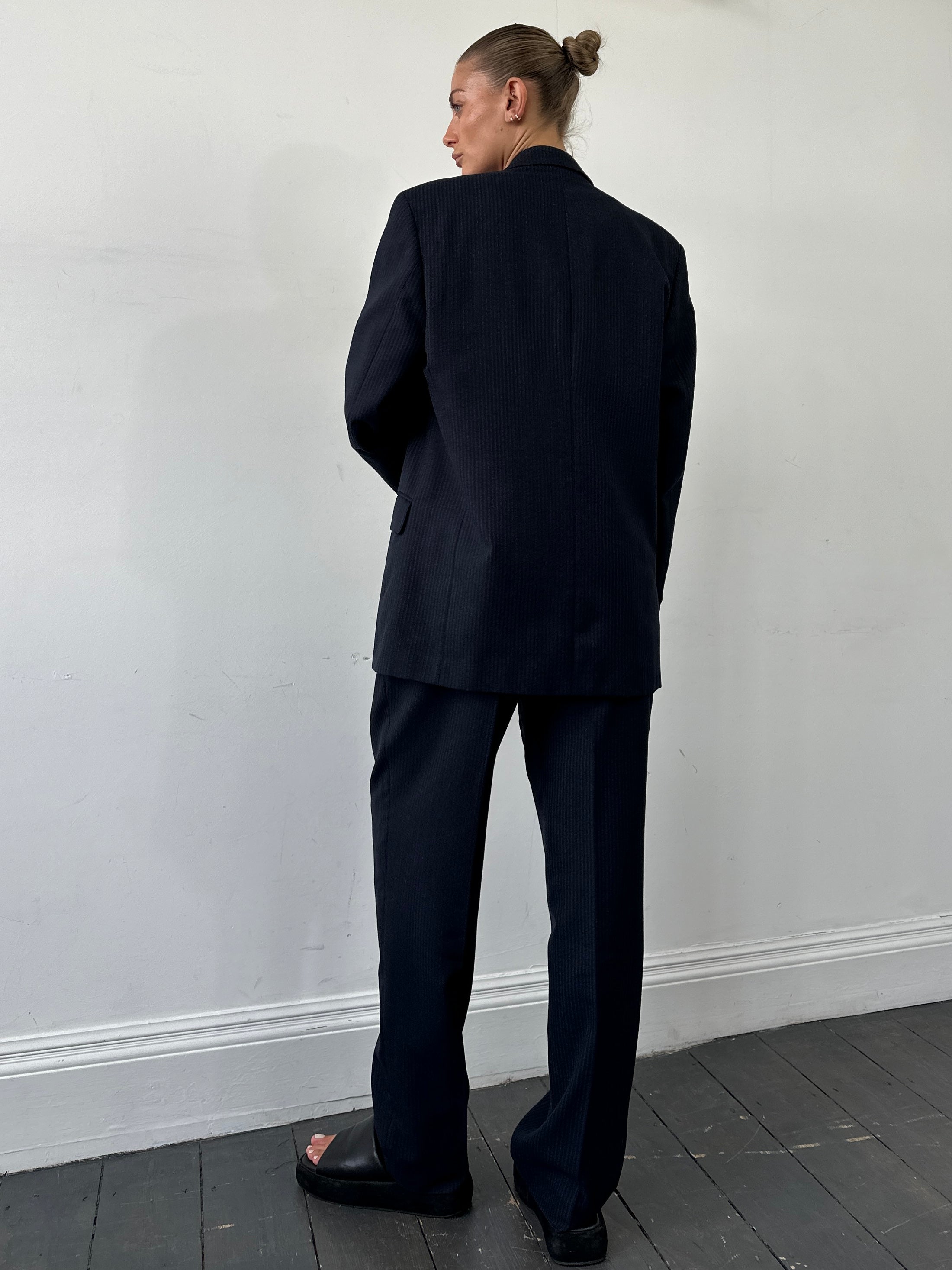 Vintage pinstripe wool jumpsuit, single-breasted suit in size 40R/W34, featuring classic tailored design and vintage style.