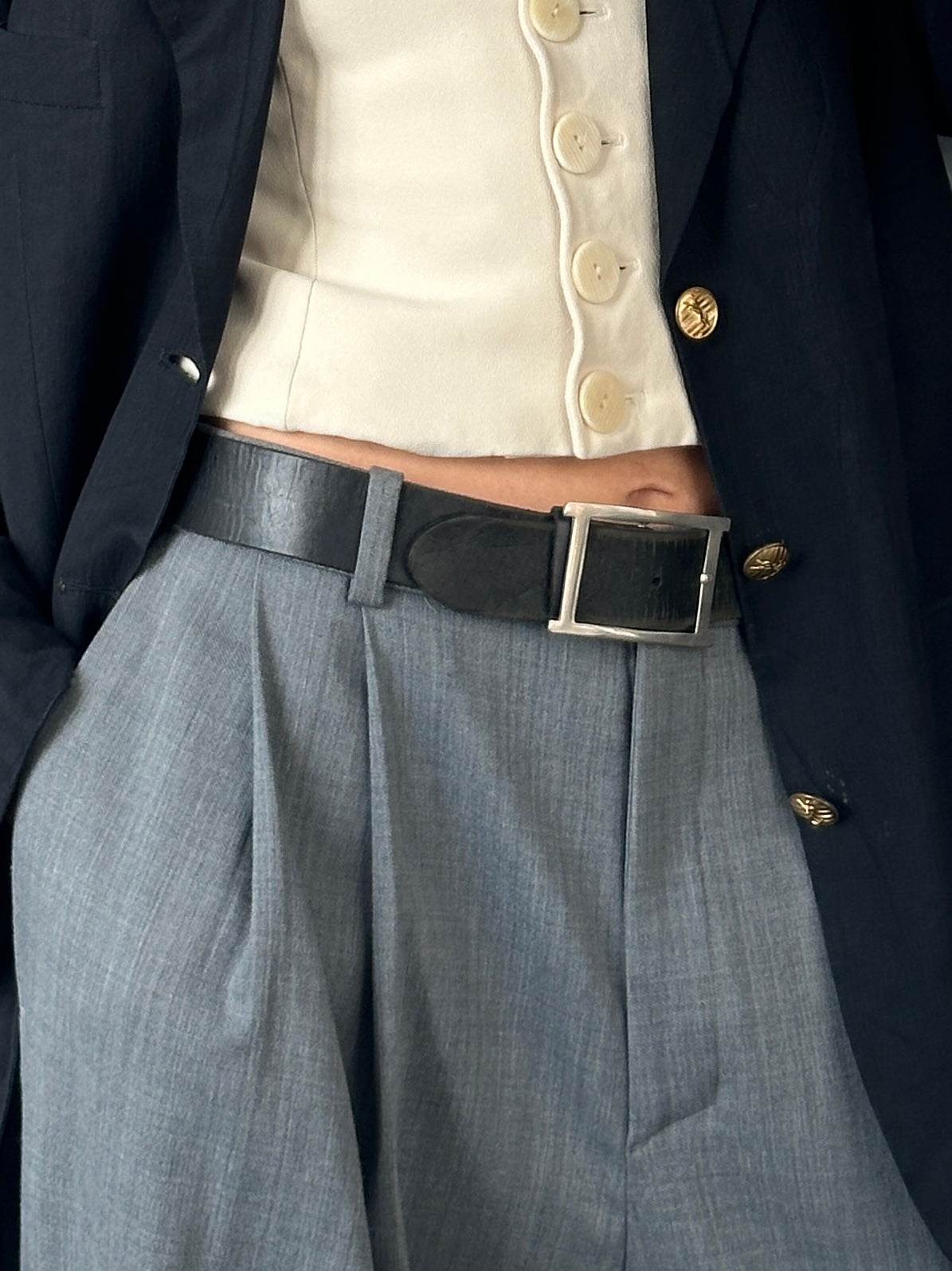 Vintage 2000s chrome leather belt, 30-34 inch waist, classic retro style with shiny metallic finish and vintage branding.