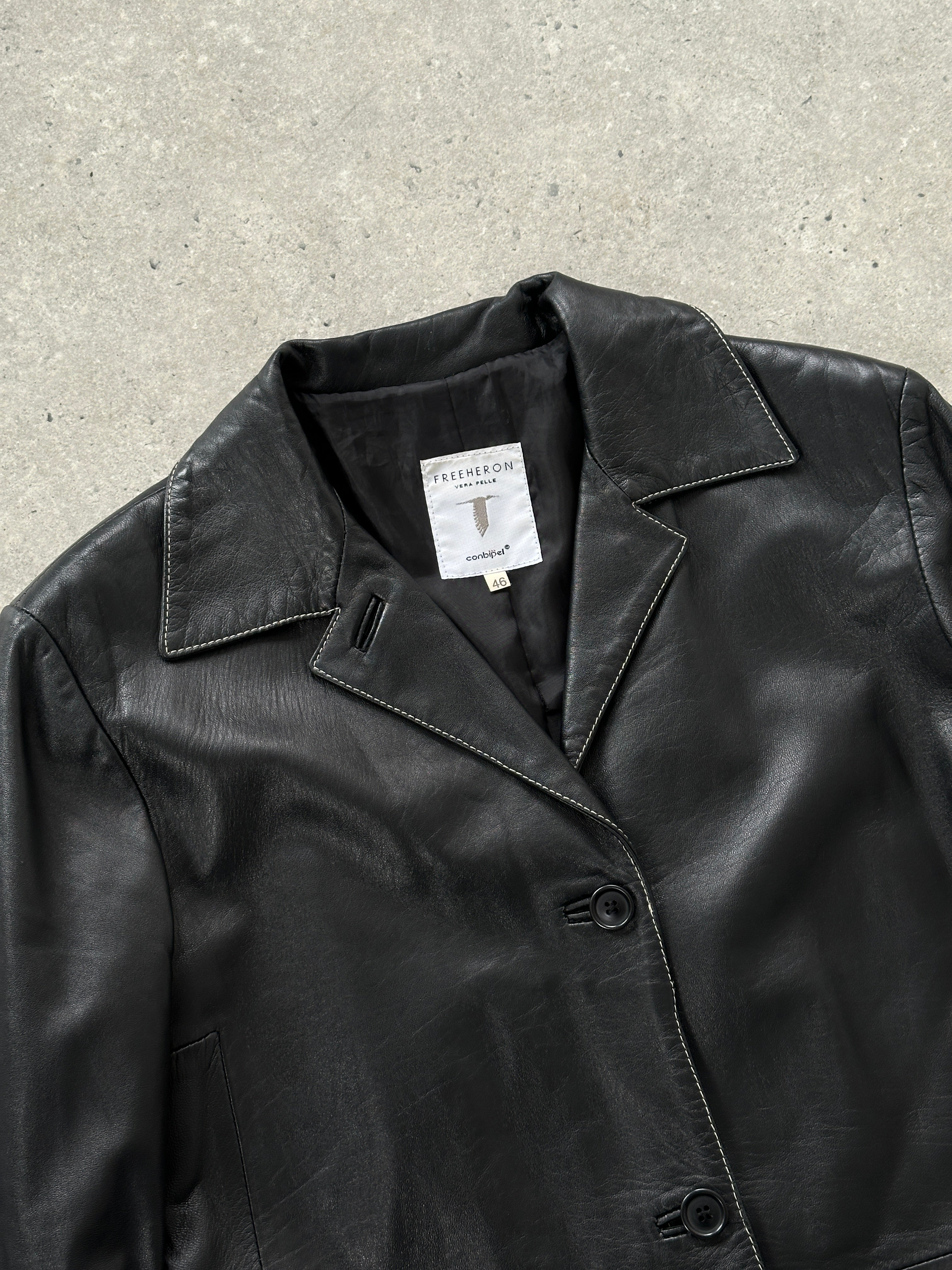 Conbipel contrast stitch leather trench coat in black, featuring tailored fit, lapel collar, and button details, for a stylish look.