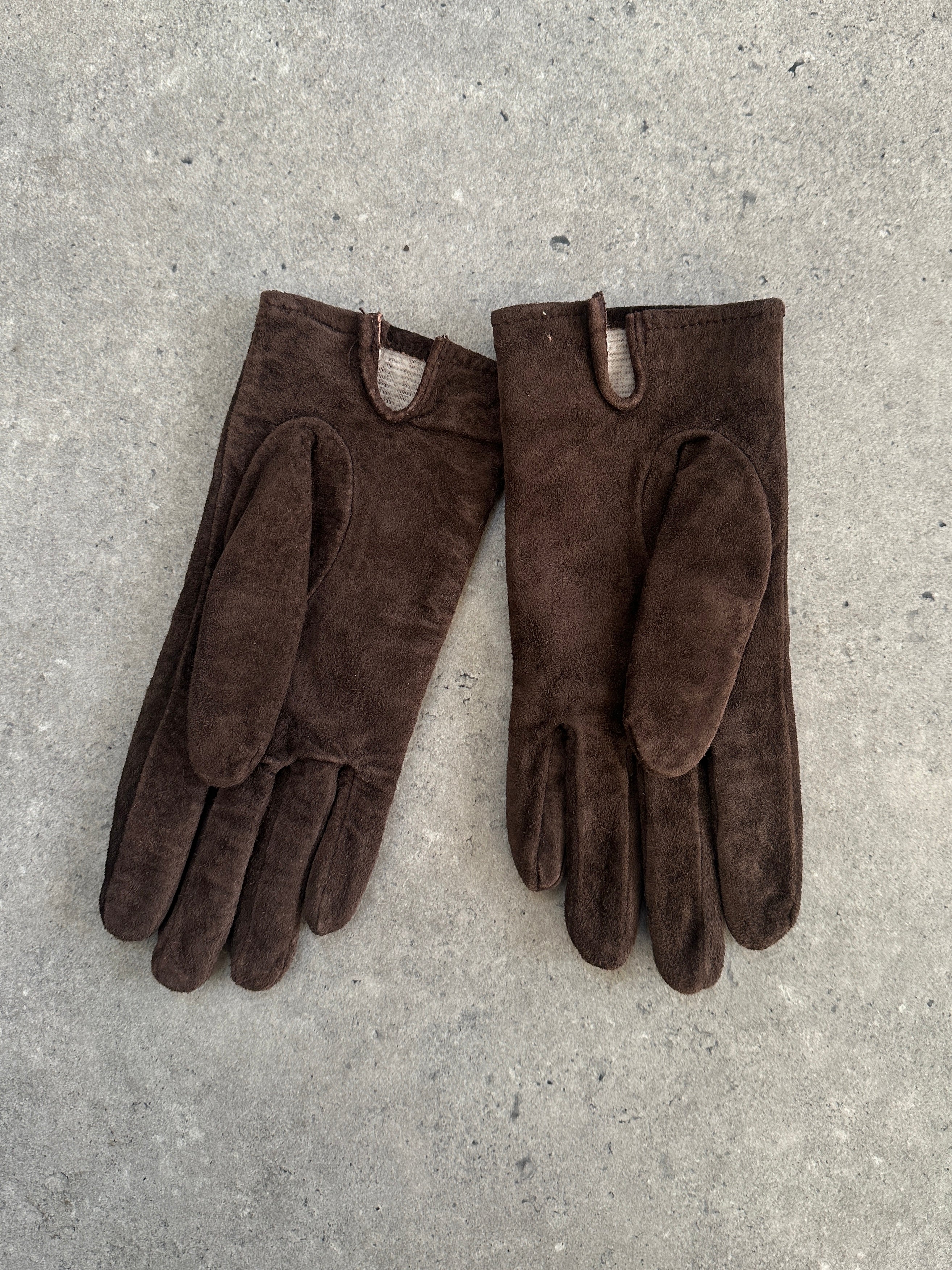 Vintage brand vintage suede gloves in size small, featuring soft suede material and classic design for stylish winter wear.