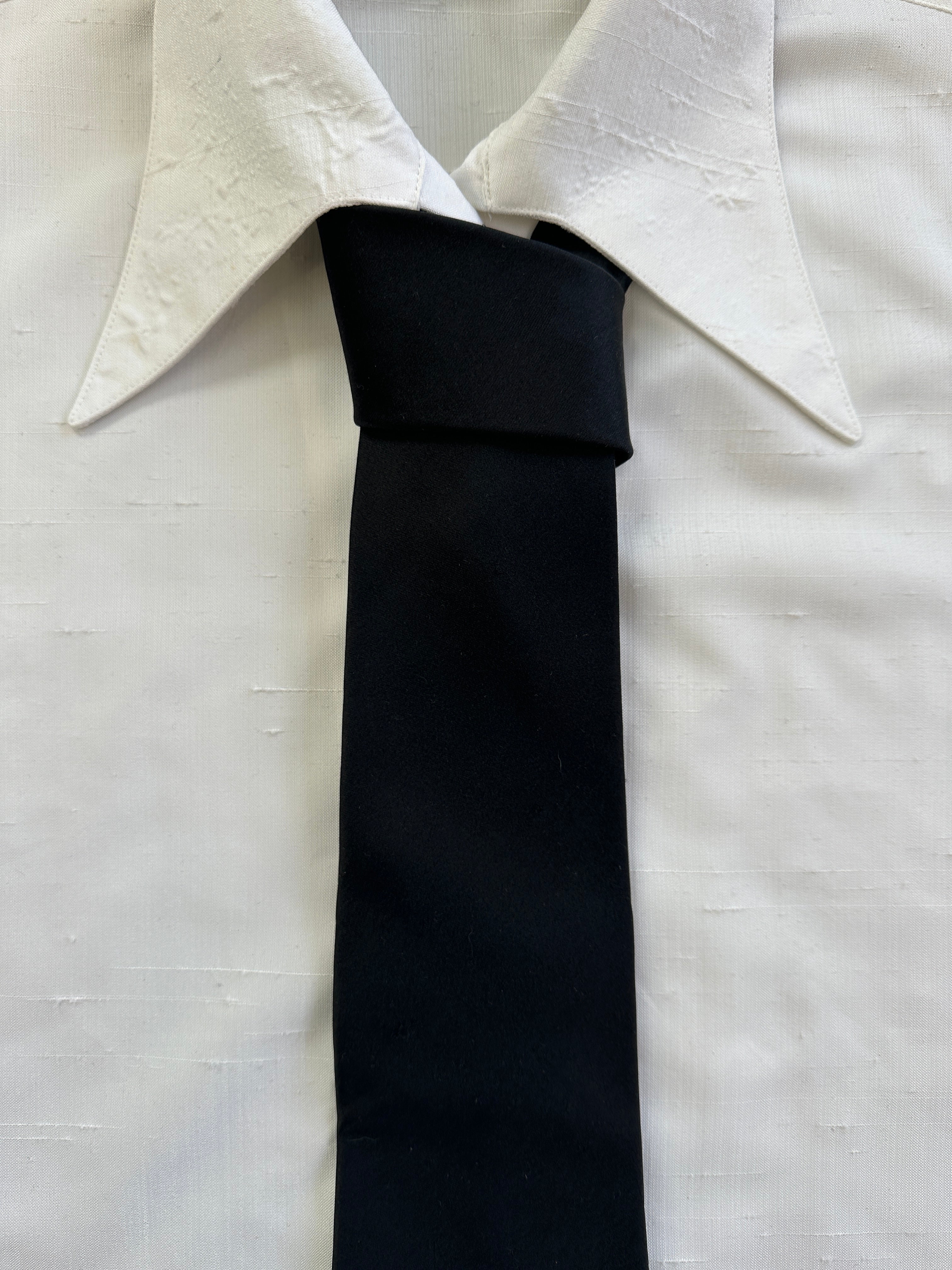 Pierre Cardin 2000s pure silk tie with classic pattern, displayed flat showcasing the elegant design and smooth fabric.
