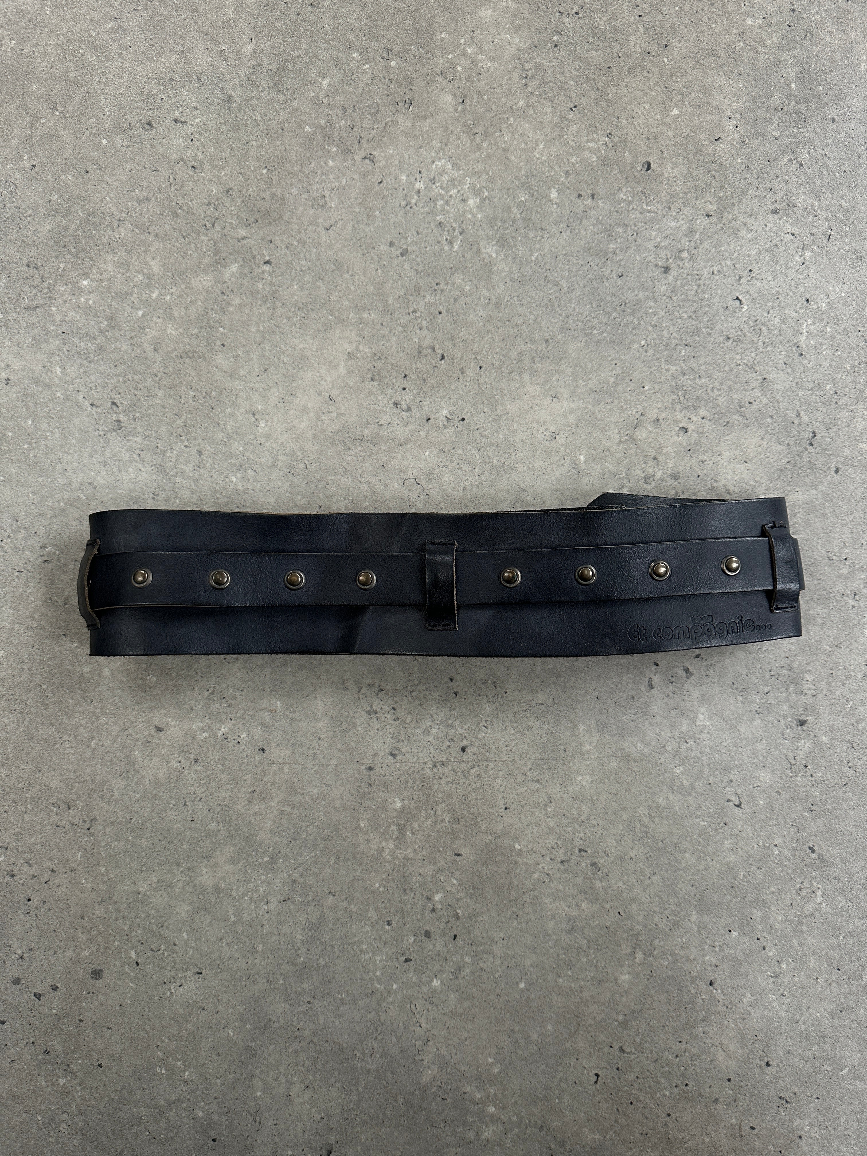 Vintage 1990s French chunky leather belt with studded design, size W32-36, showcasing a retro vintage style belt.