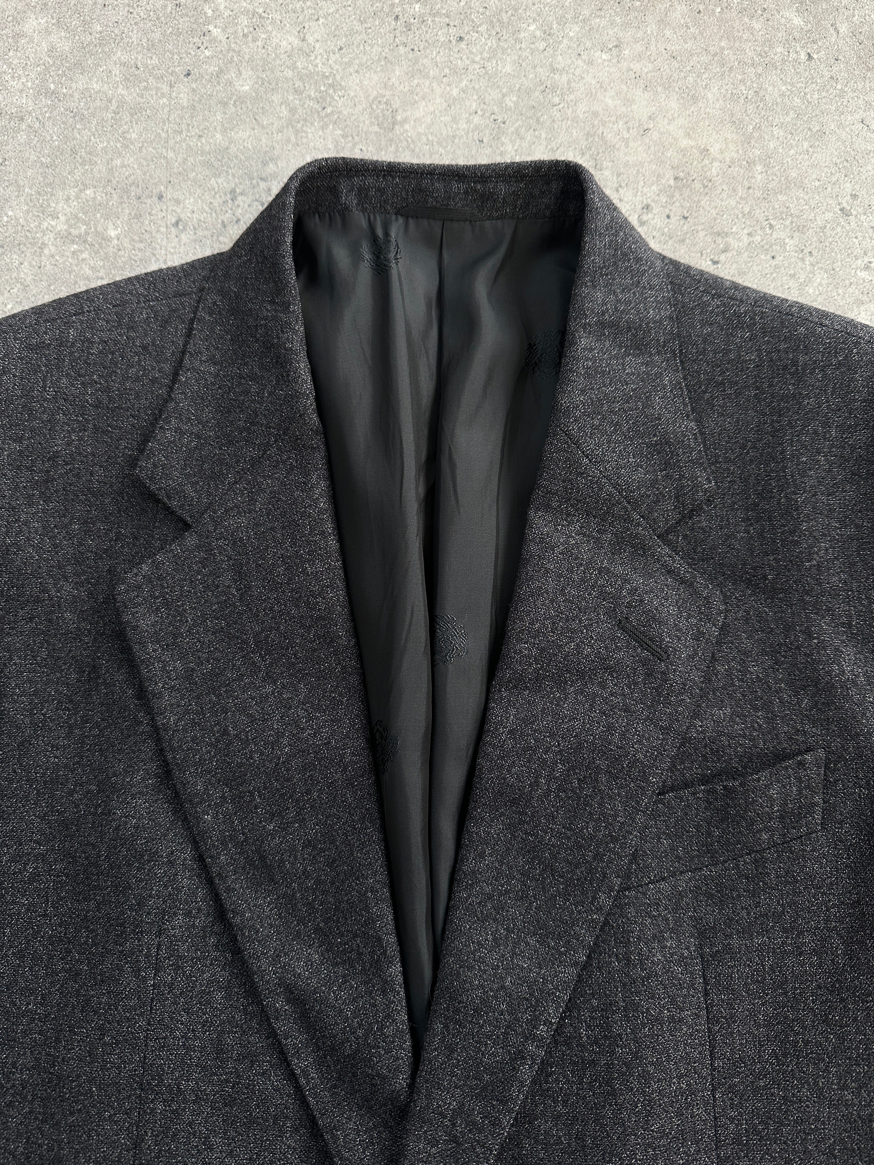 Loro Piana Ascari Parma 1990s pure wool single-breasted blazer in size 40R/L, shown on a hanger with a classic design.