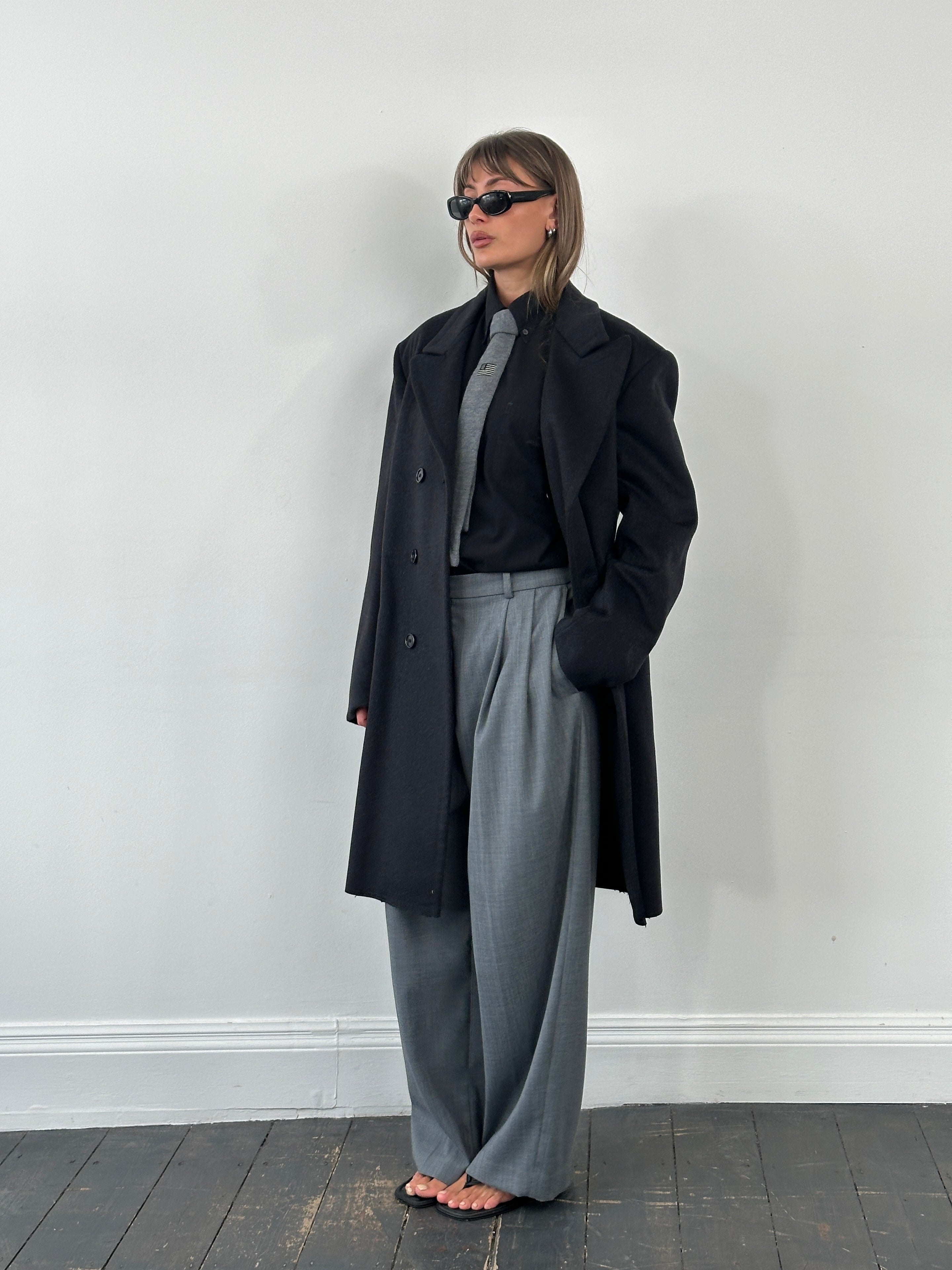 Vintage Italian 1980s wool double-breasted coat in XL, showcasing classic style and textured fabric.