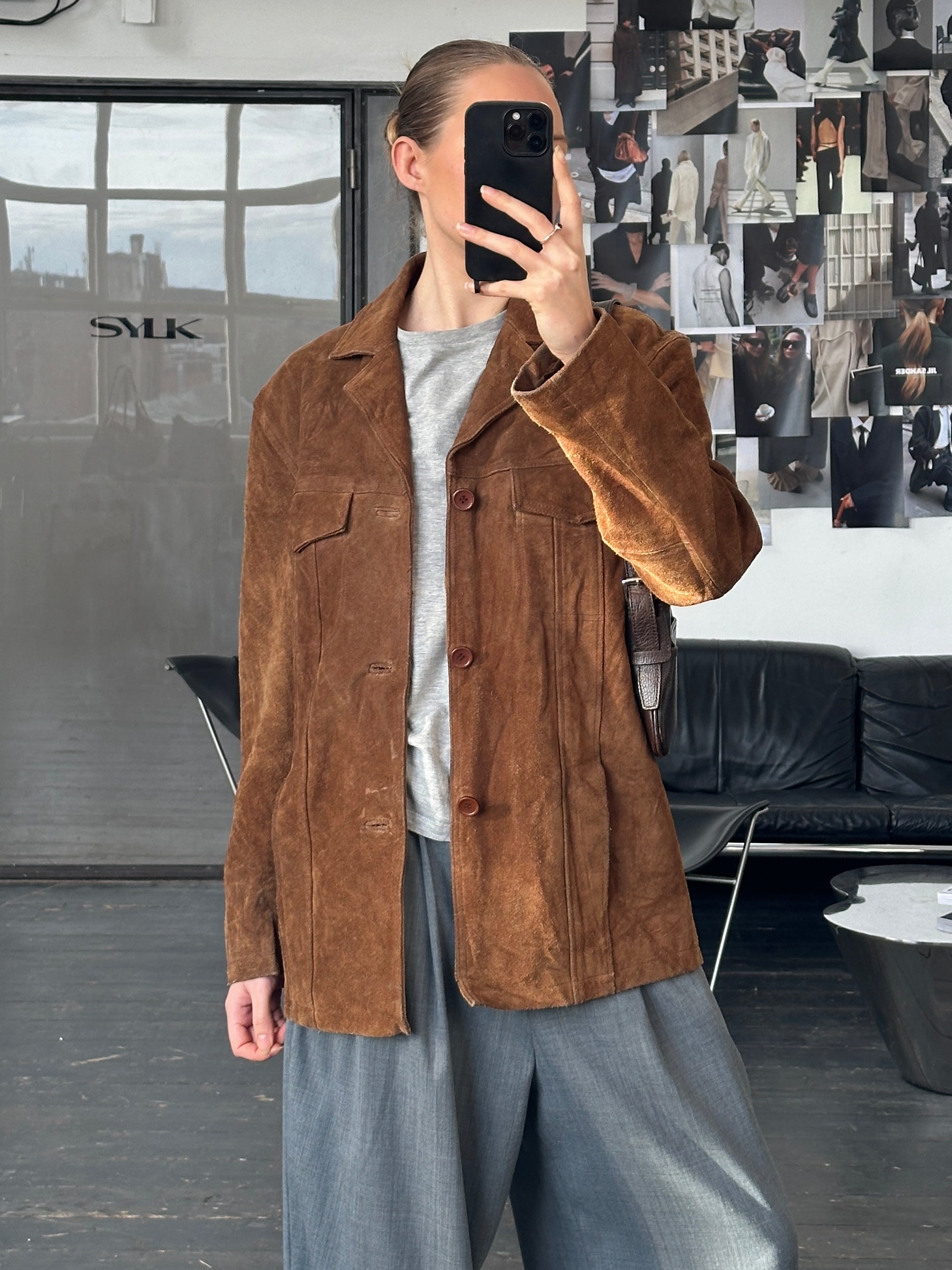 Vintage 1990s suede leather jacket in size large, classic retro style with a soft brown finish and tailored fit.