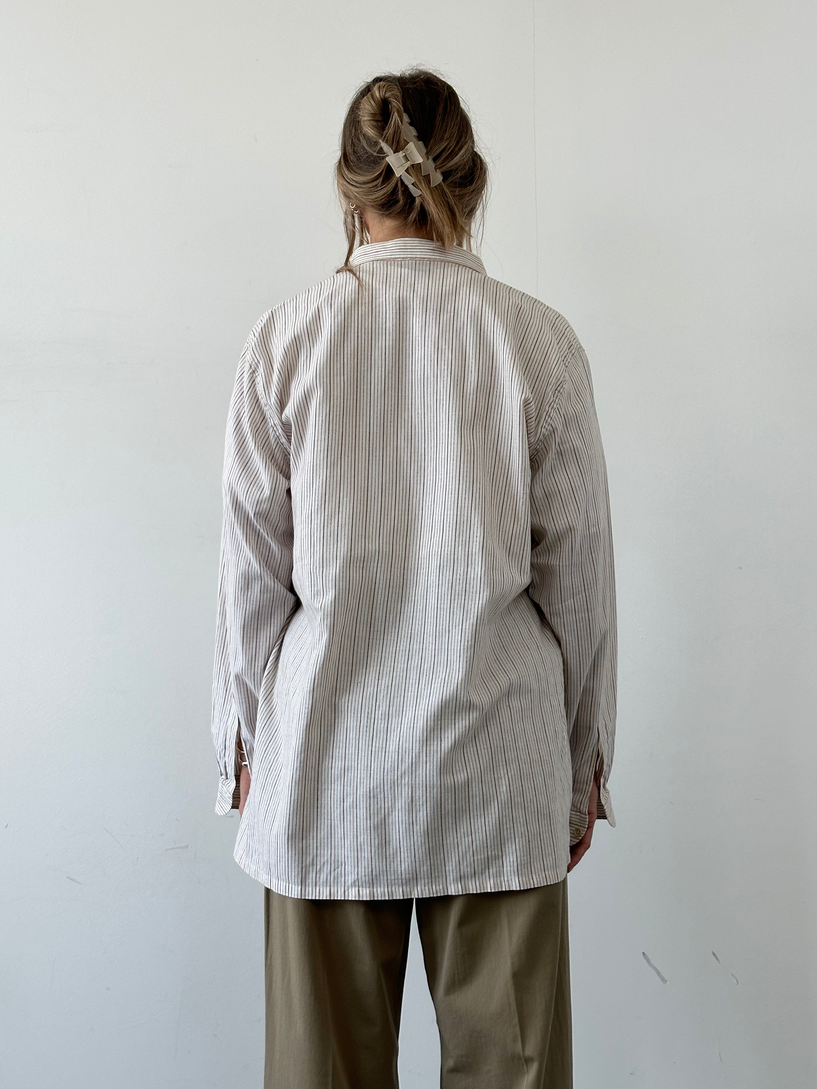 Missoni 90s cotton stripe shirt in large/extra-large size, featuring vibrant multicolored horizontal stripes and classic button-up design.