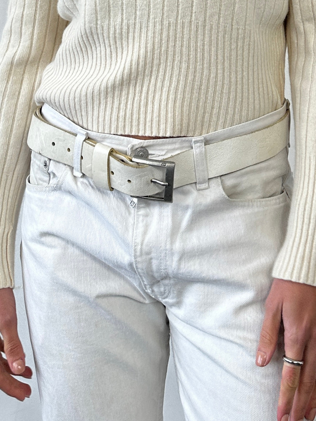 Vintage distressed leather belt in size W36-40 with a rugged, worn appearance showing natural leather texture and vintage brand details.