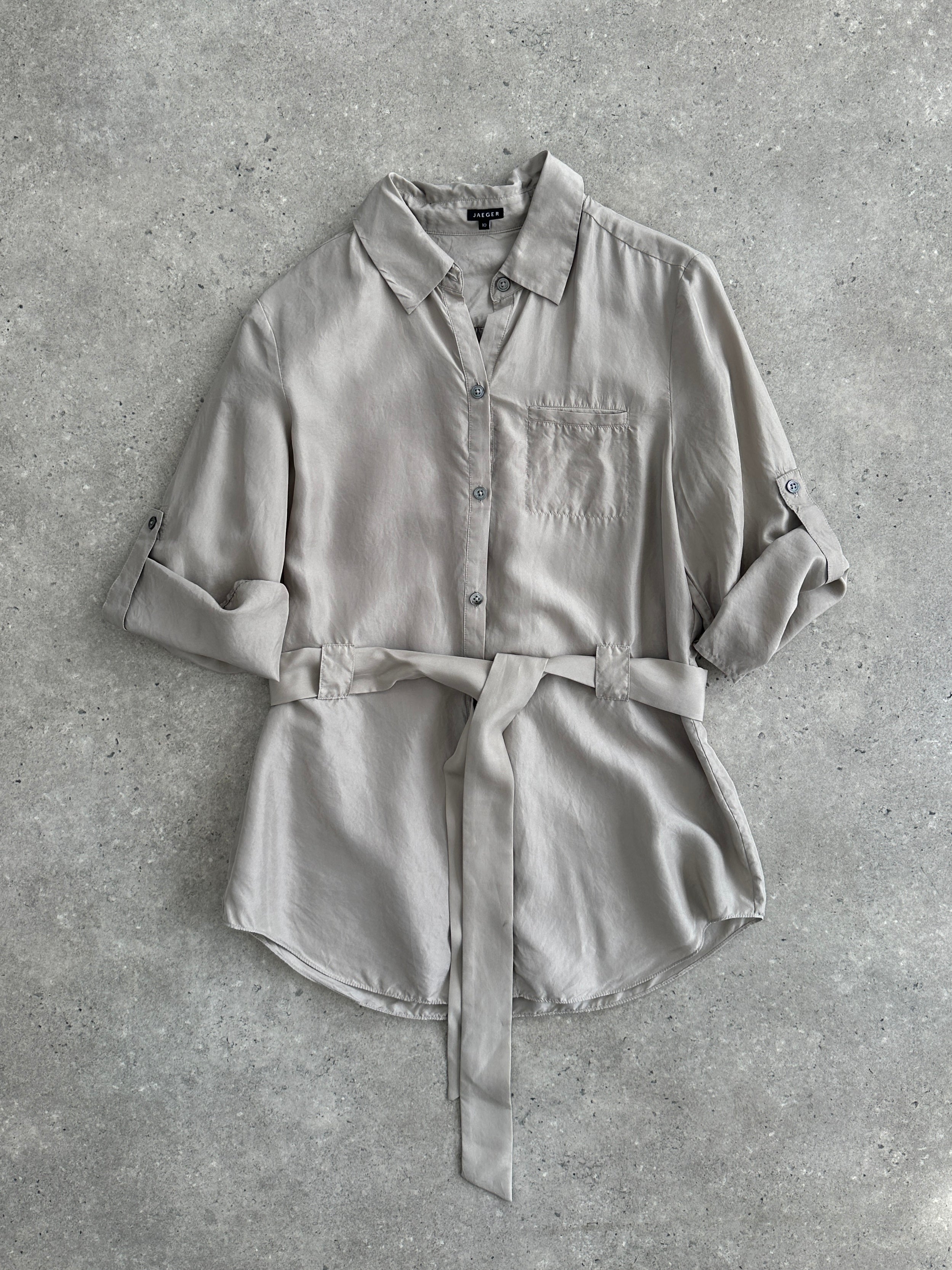 Jaeger pure silk belted shirt in size S, featuring a classic design with a collar and button-front closure.