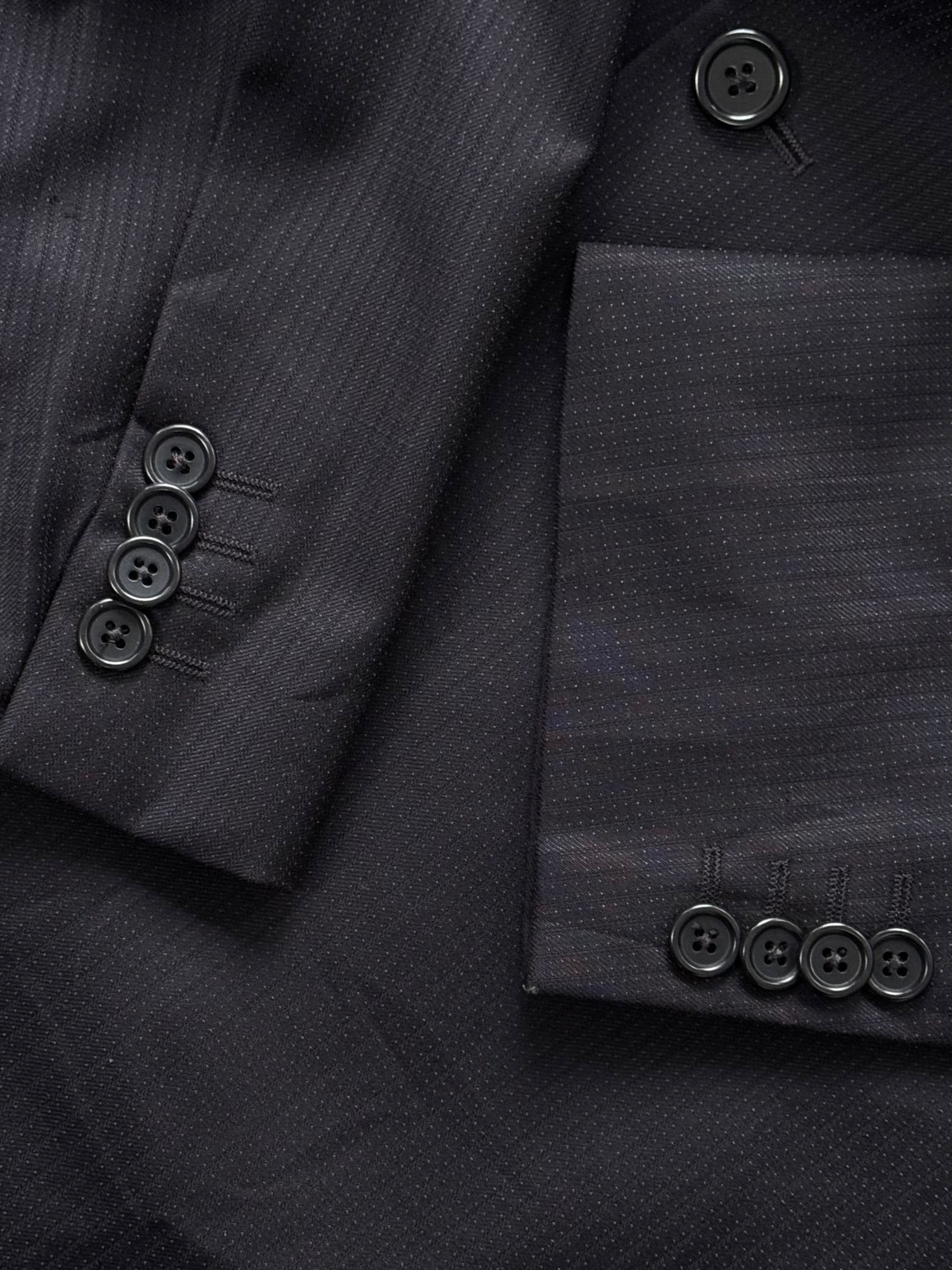 Loro Piana 1990s pure wool single-breasted blazer in size 42R/L, tailored fit, classic design, in a neutral color.