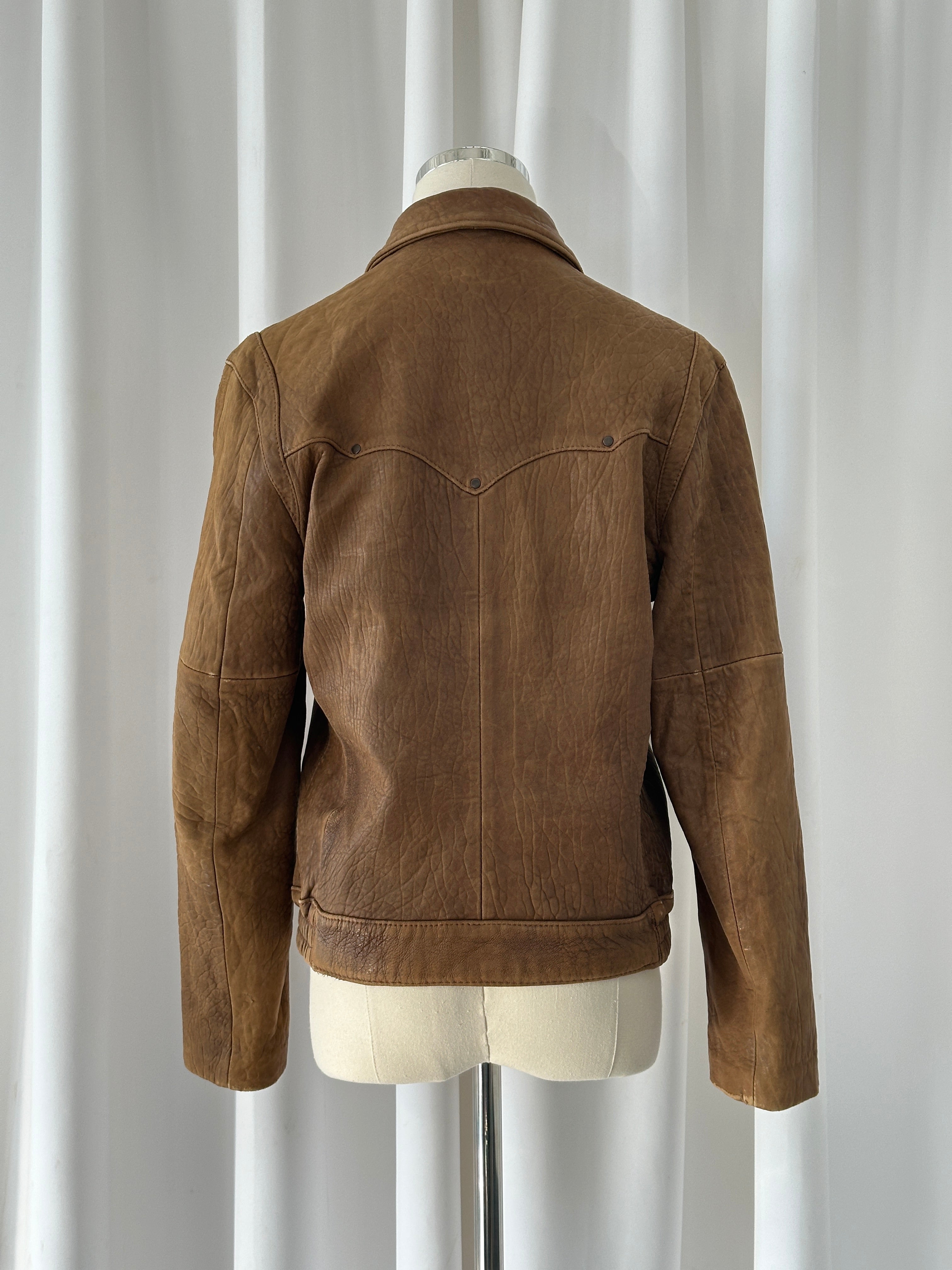 Vintage USA 1980s leather bomber jacket in XS/S with classic design and aged leather, showcasing retro style and craftsmanship.