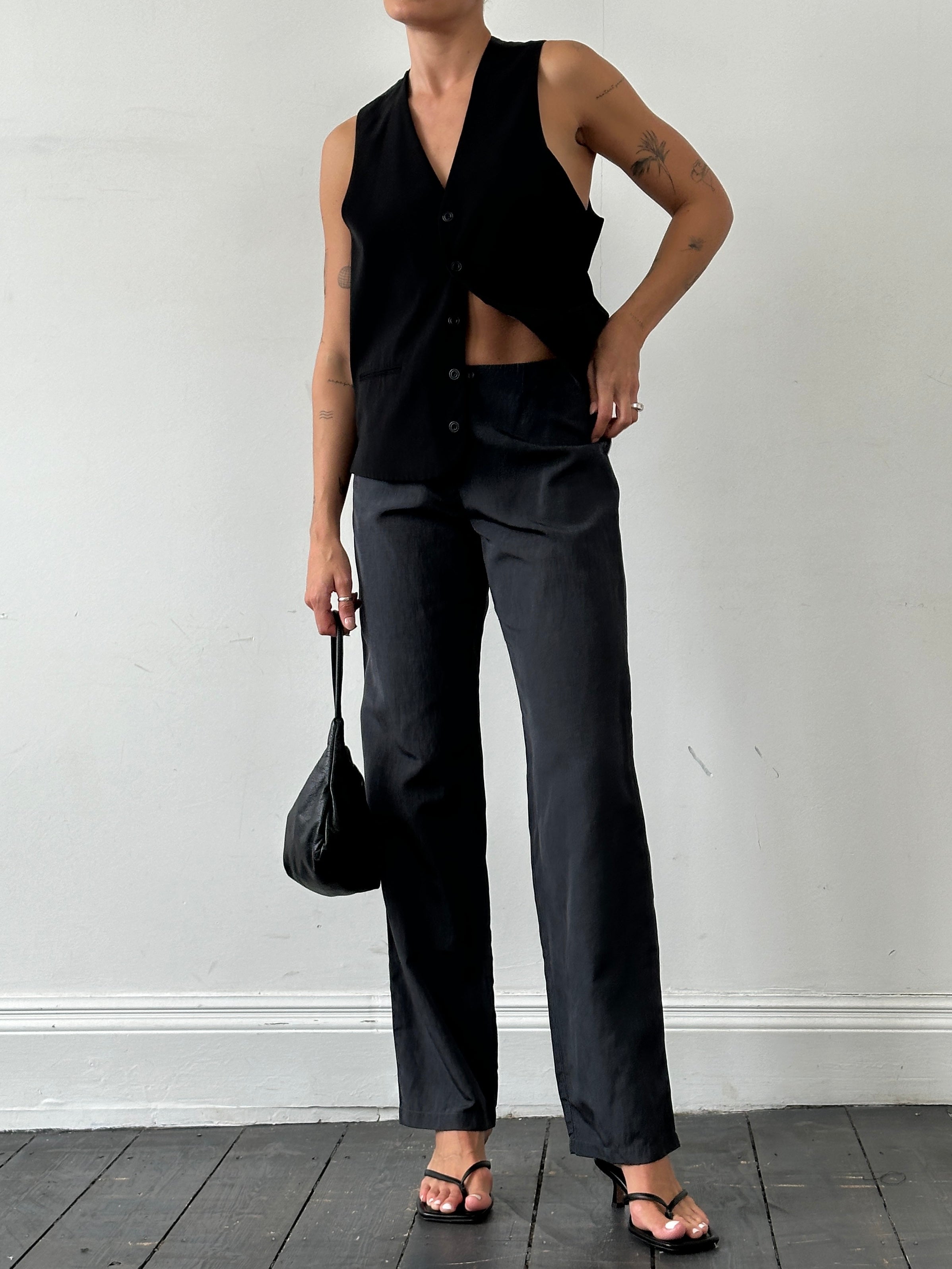 Armani Jeans linen straight leg mid-waist trousers in W28, shown on a model with neutral background.