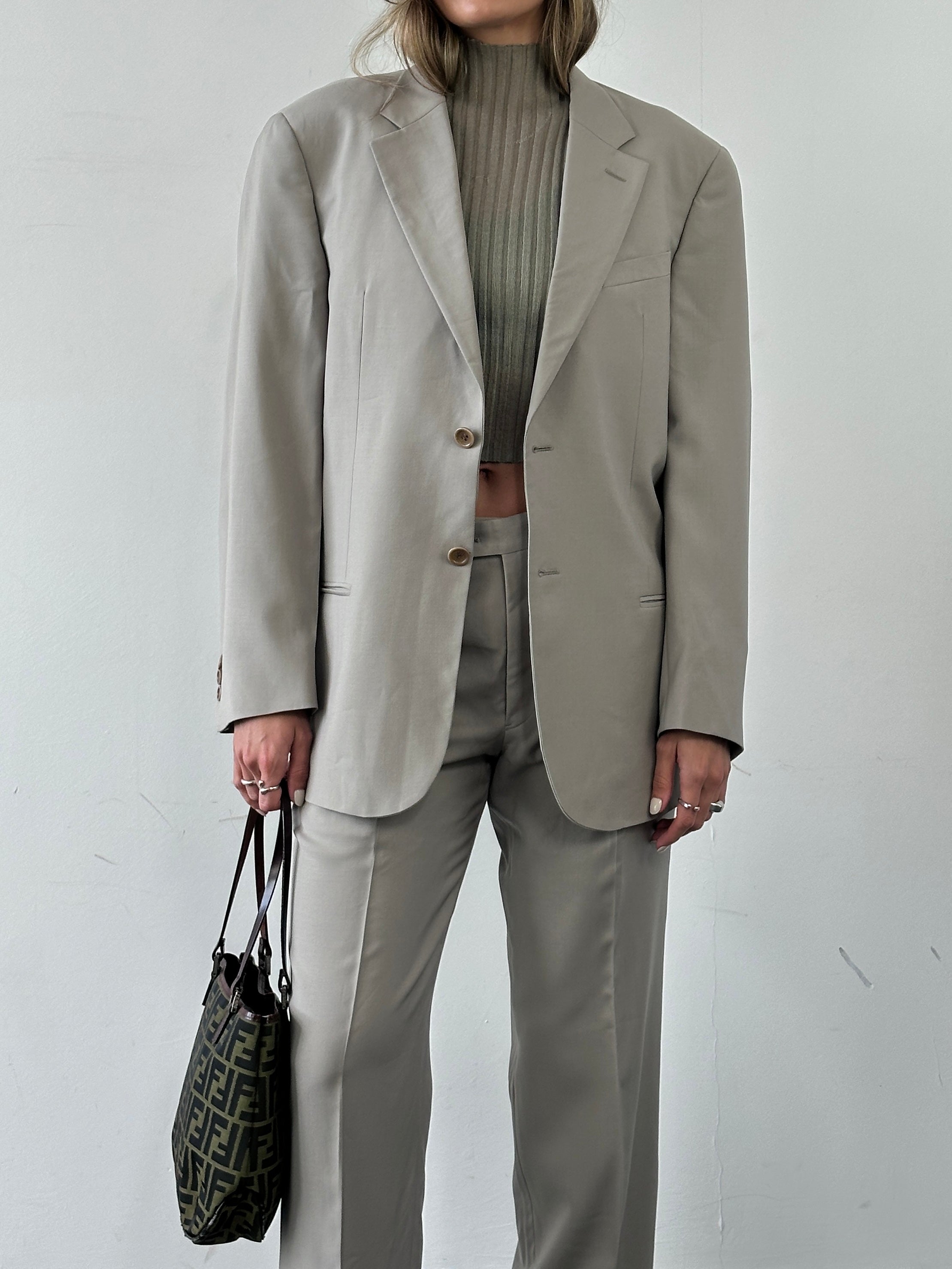Armani Collezioni pure wool single-breasted suit jumpsuit, size 40R/W30, tailored fit with lapel collar and front buttons.