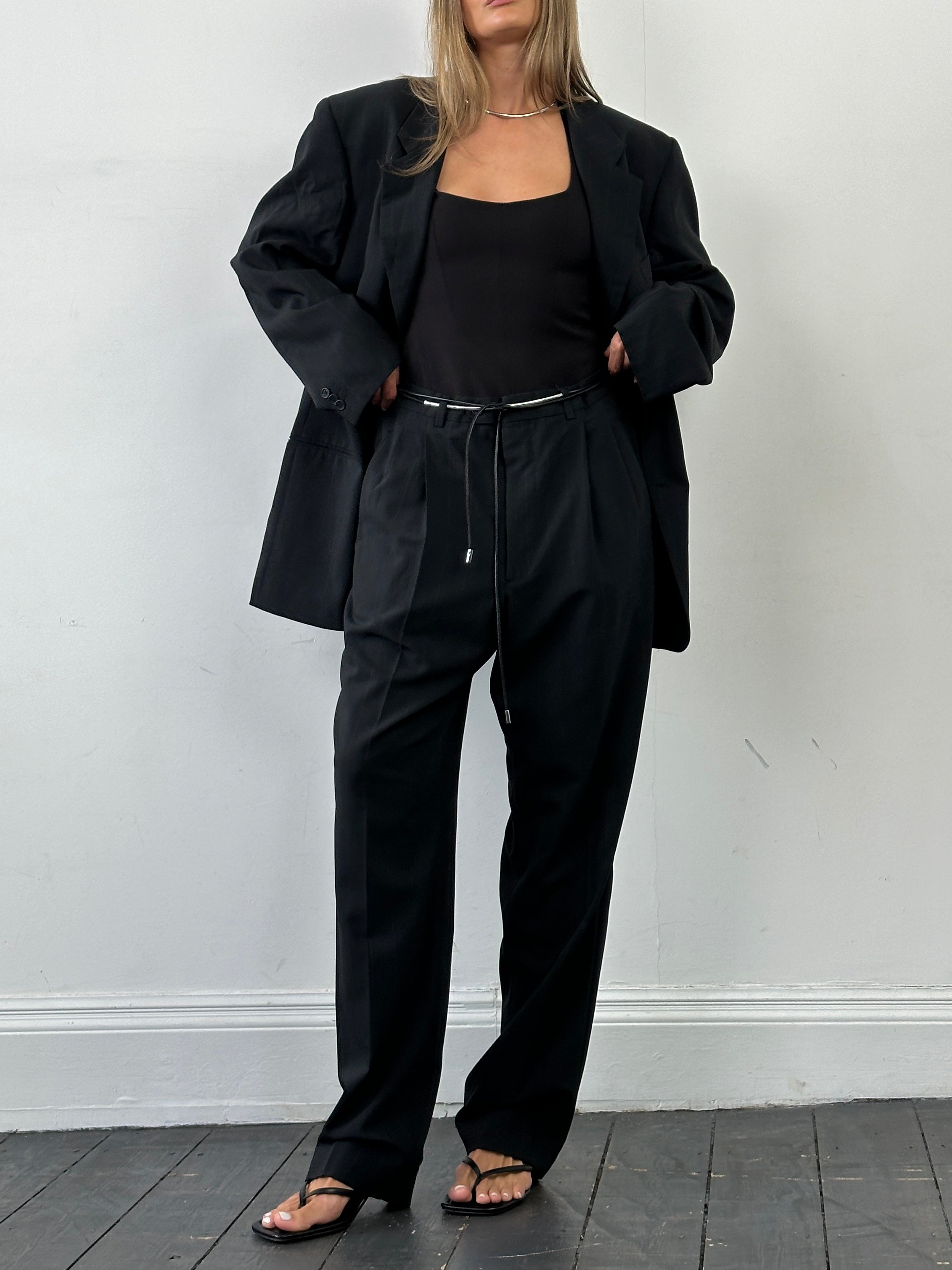 Giorgio Armani Le Collezioni pinstripe wool single-breasted suit in size 46R/W36, displayed as a stylish jumpsuit.