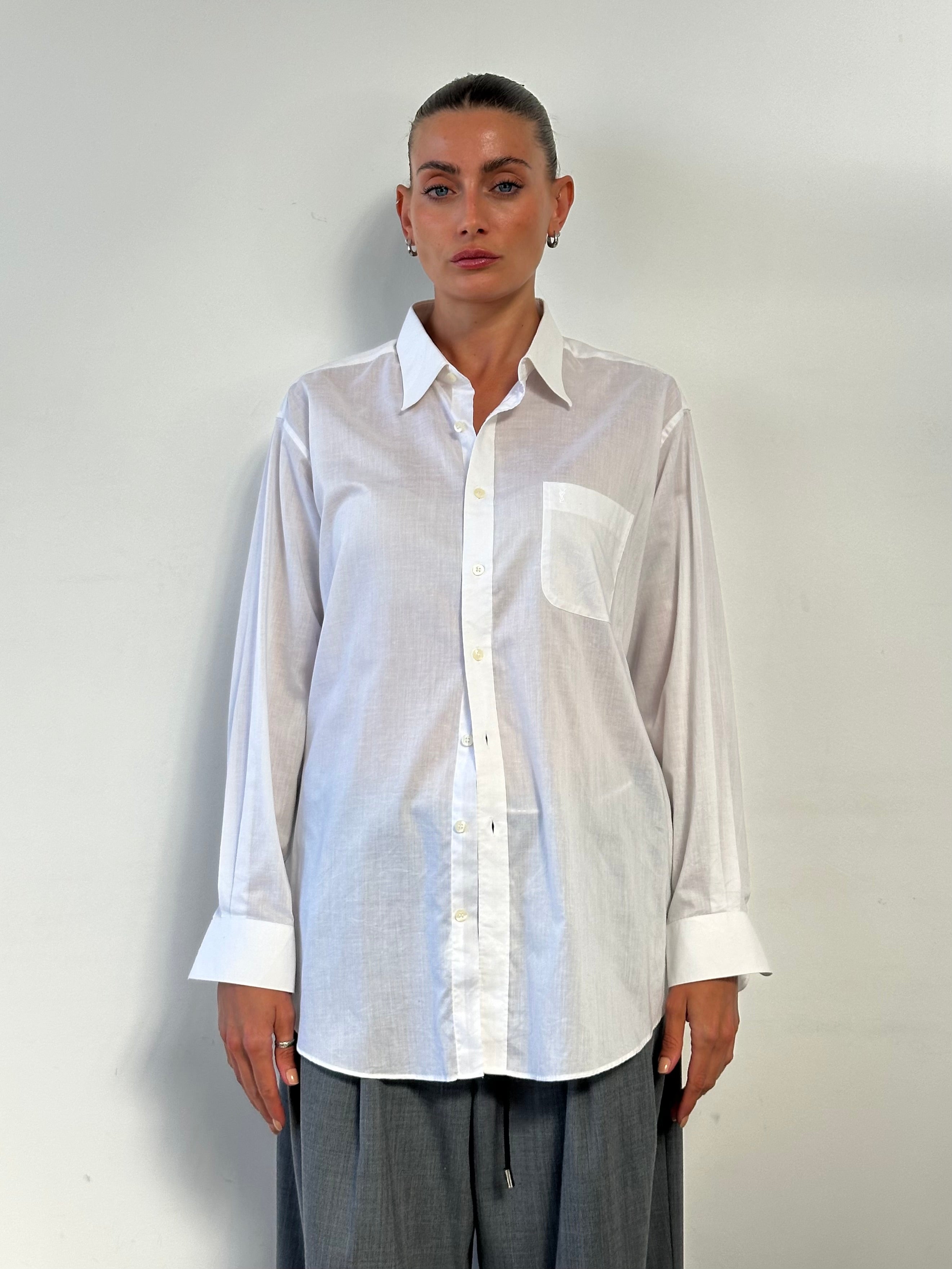 Yves Saint Laurent 90s cotton logo shirt in size L/XL, featuring classic branding and casual fit, displayed on a neutral background.