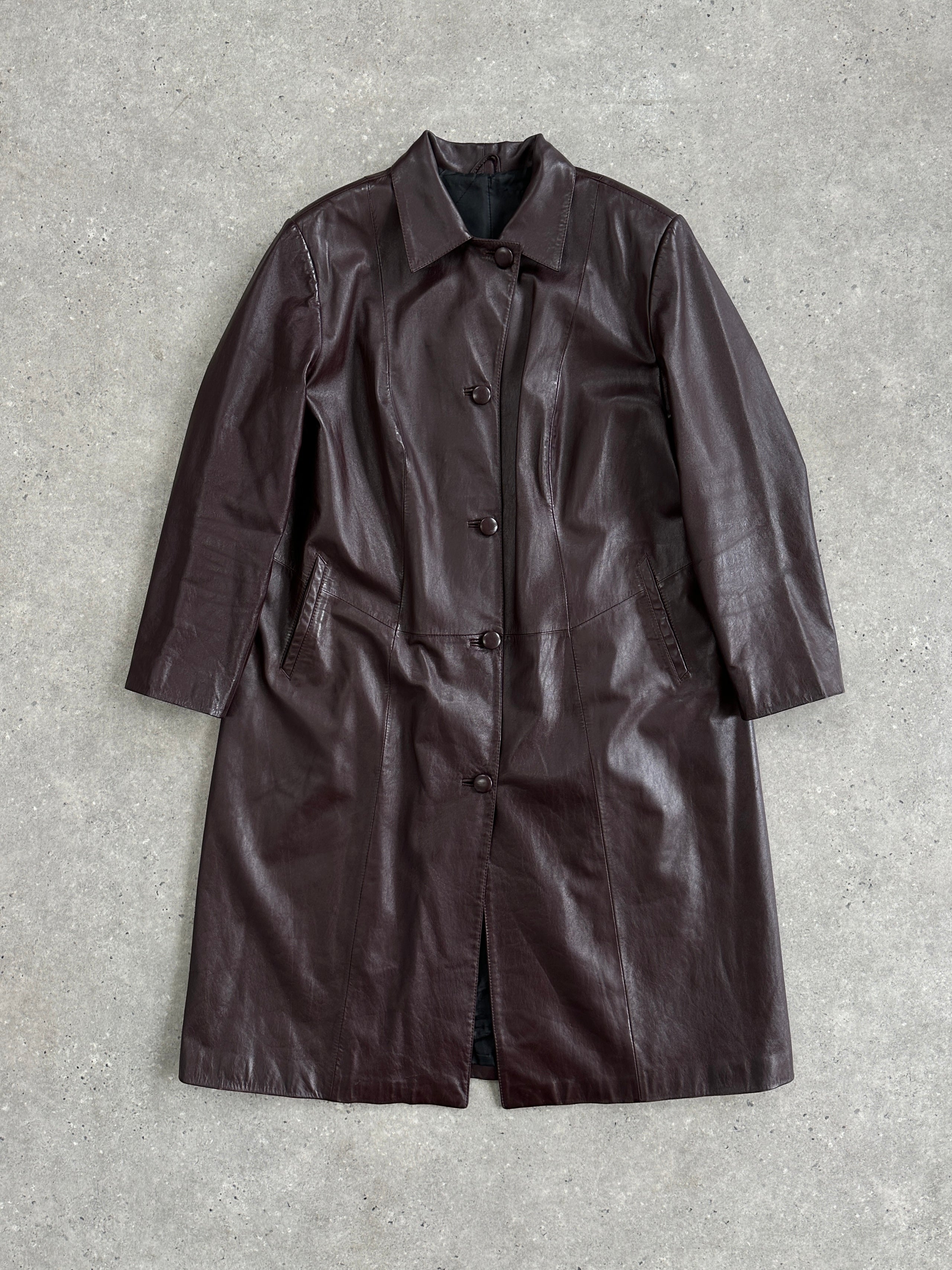 Vintage leather trench coat jacket in size large, featuring classic design and natural distressed leather finish.