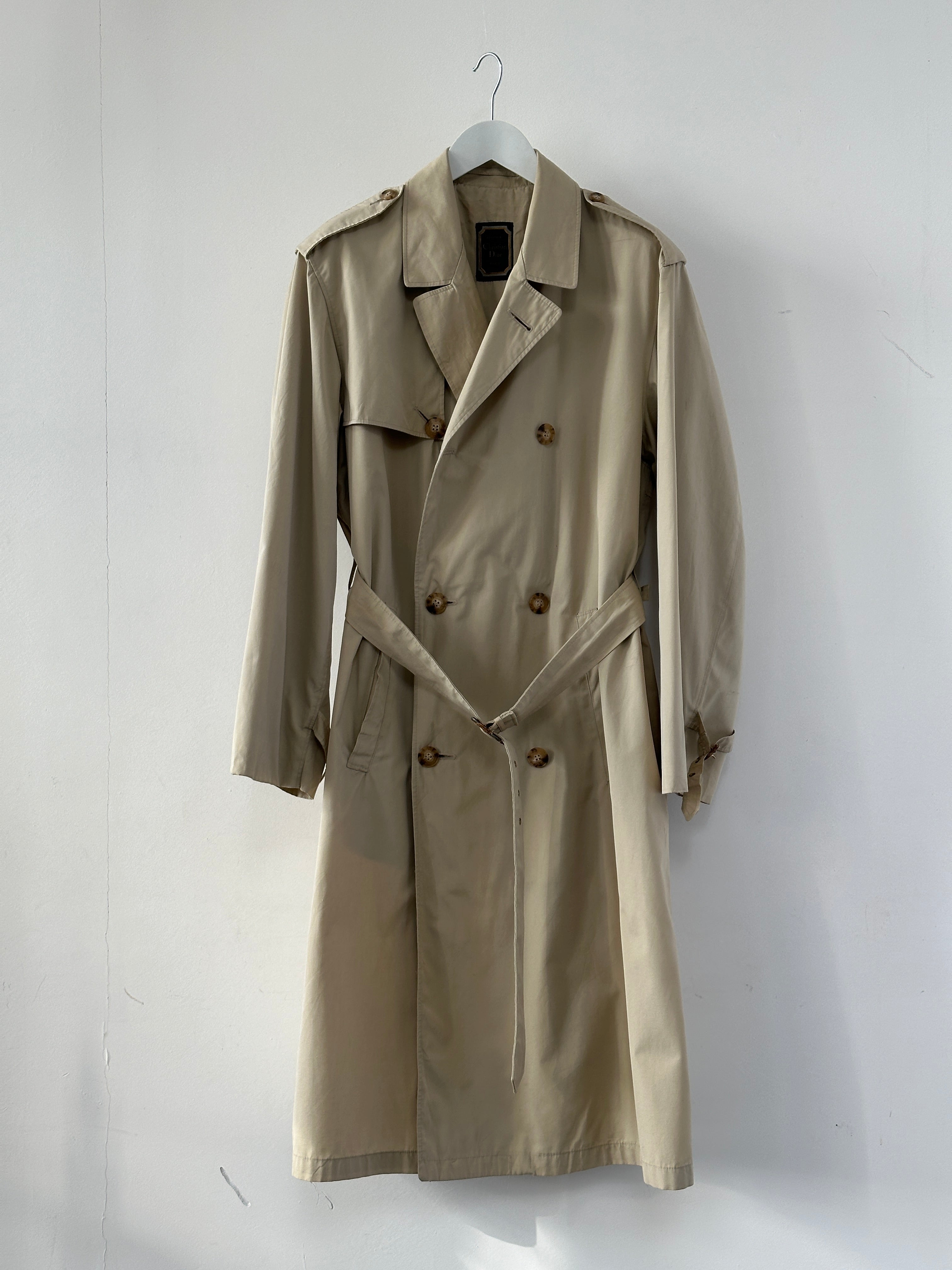 Christian Dior Paris cotton double-breasted belted trench coat in beige, size 40R/XL, featuring classic design and stylish lapels.