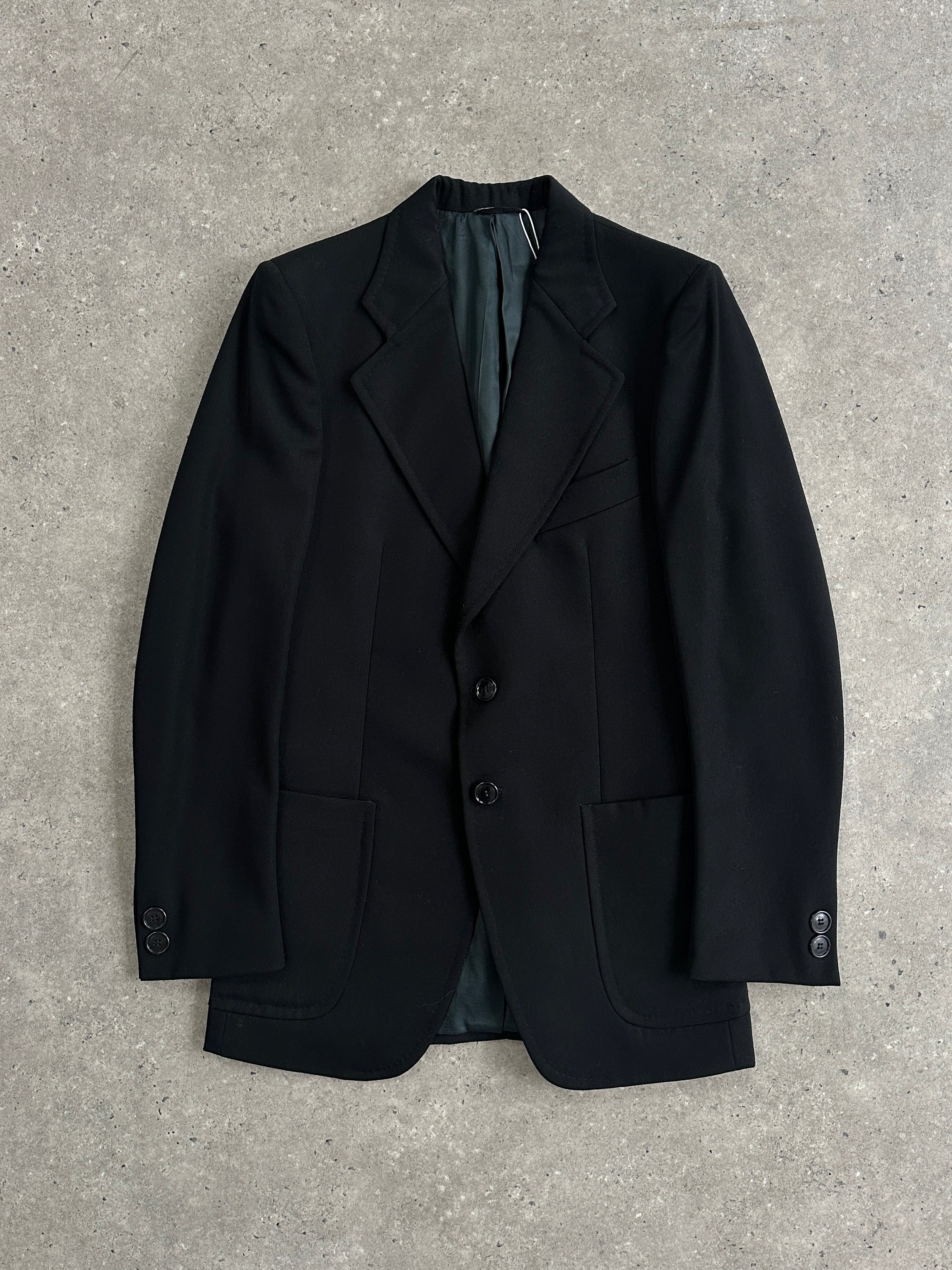 Vintage Italian vintage pure wool single-breasted blazer in size S, showcasing classic tailored style and textured fabric.
