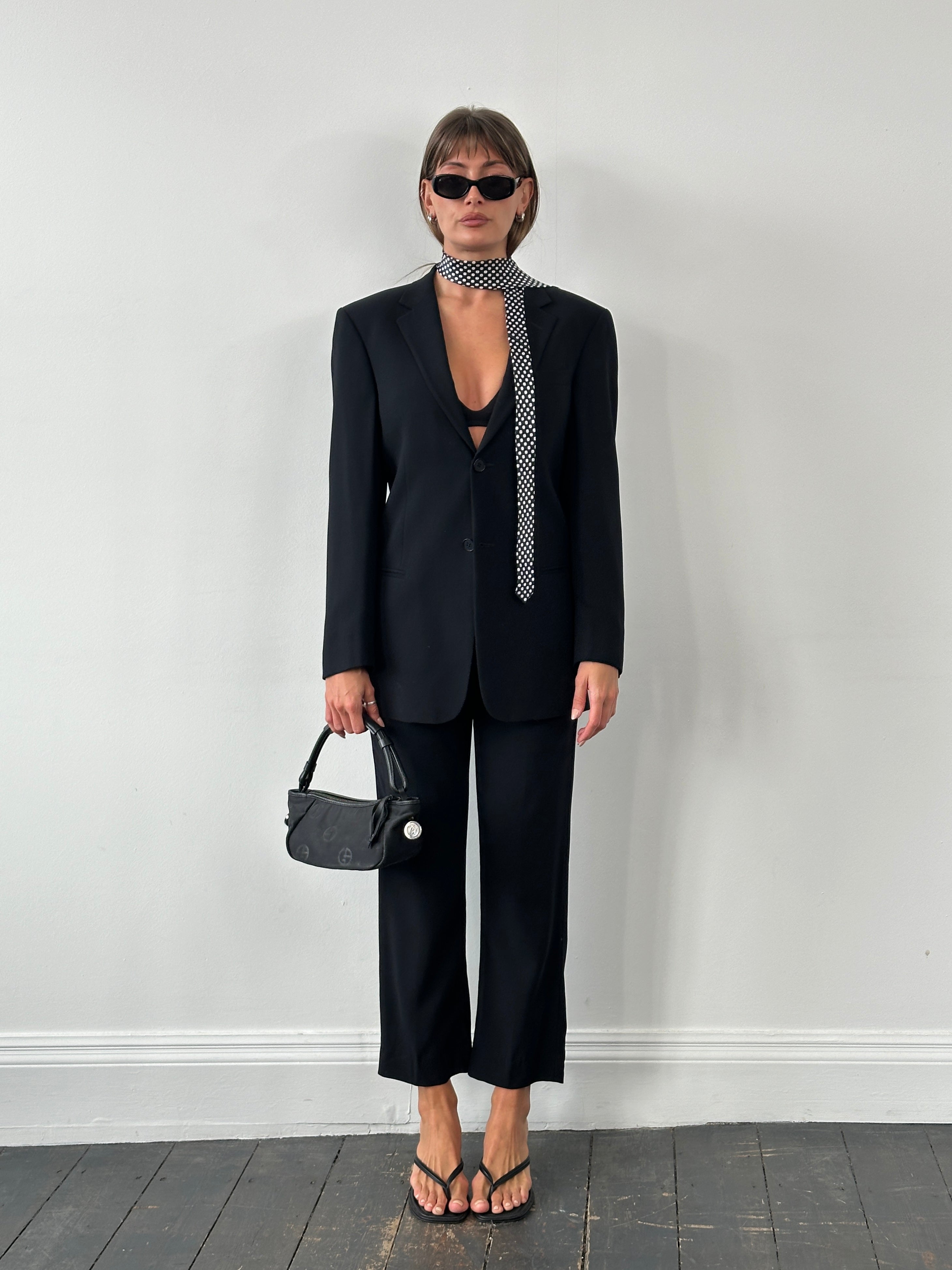 Emporio Armani 1990s pure wool single-breasted suit in size 36R/W28, tailored with a classic notch lapel and structured fit.