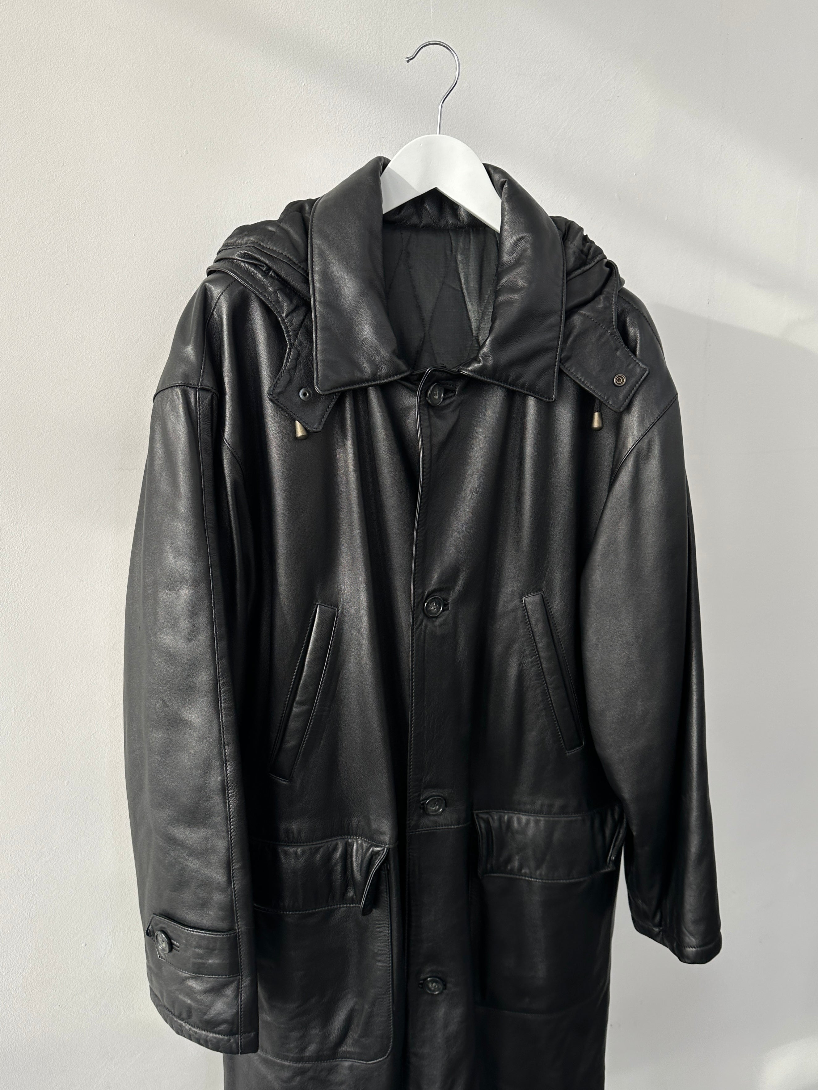 Vintage Italian vintage leather hooded trench coat in XL/XXL, featuring classic design and textured leather material.