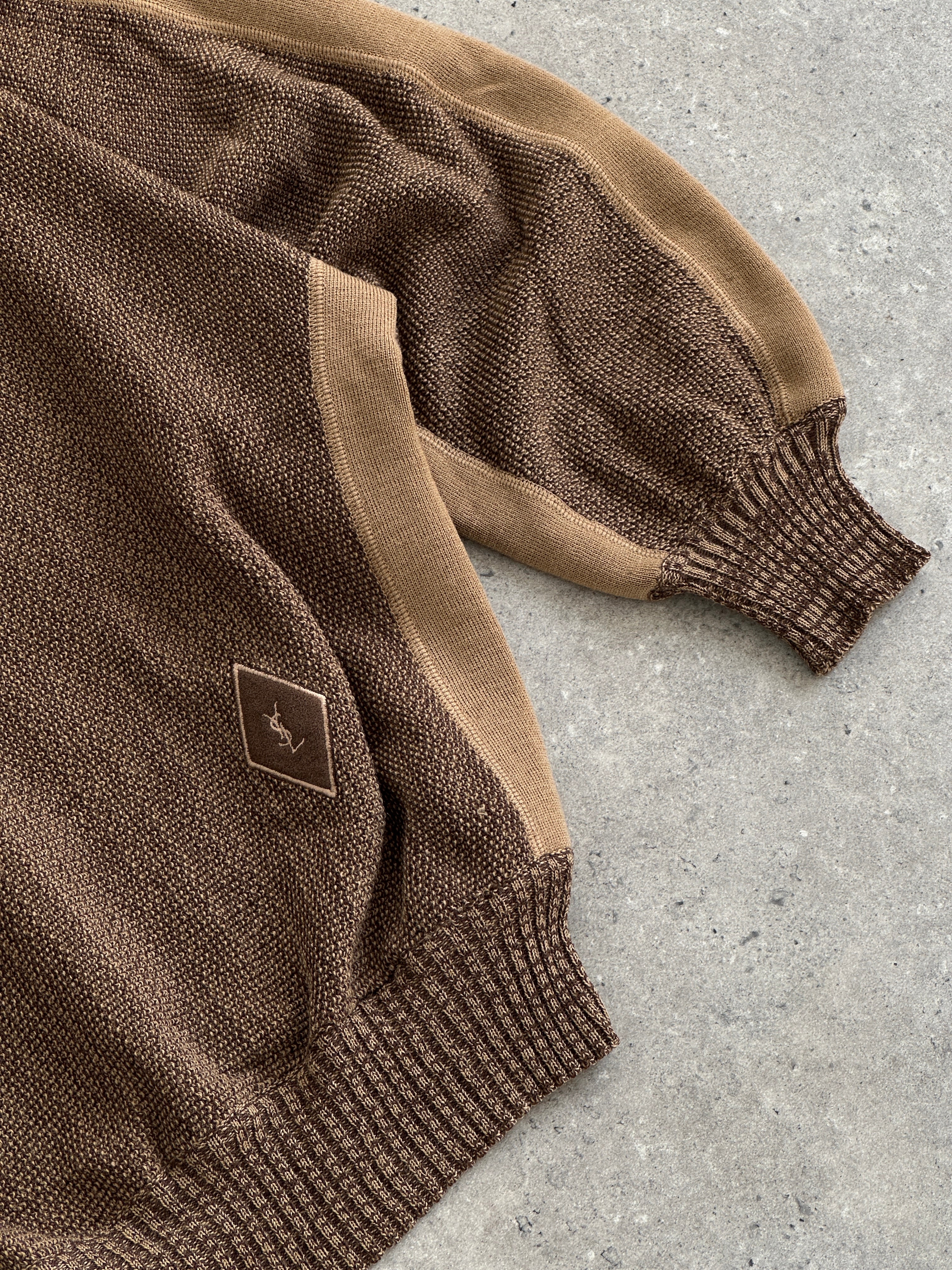 Yves Saint Laurent Tricots 80s pure wool V-neck jumper in black, showing the soft knit fabric and classic fit.
