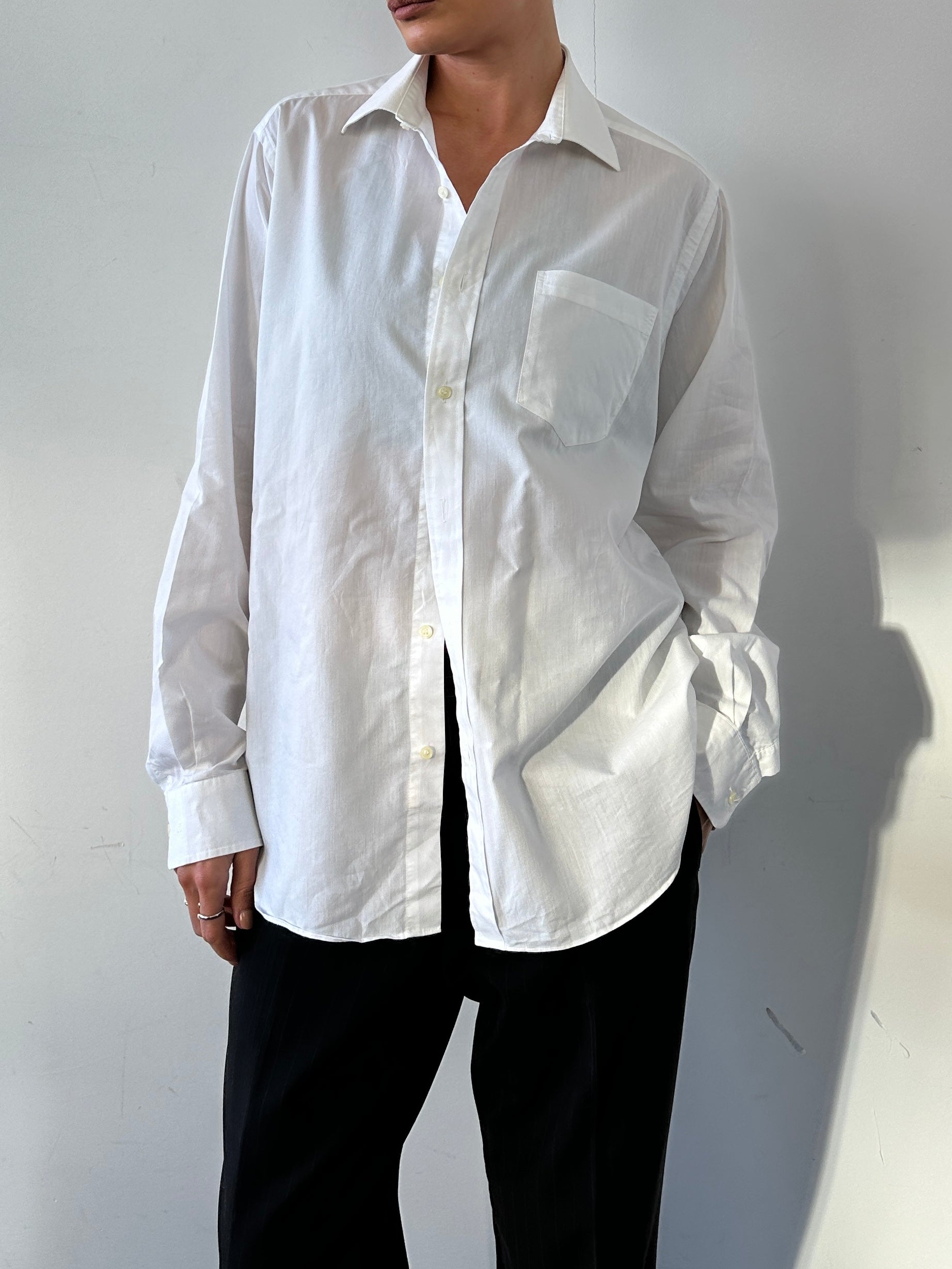 Christian Dior cotton logo shirt in size M/L, featuring the iconic Dior branding and classic shirt design.