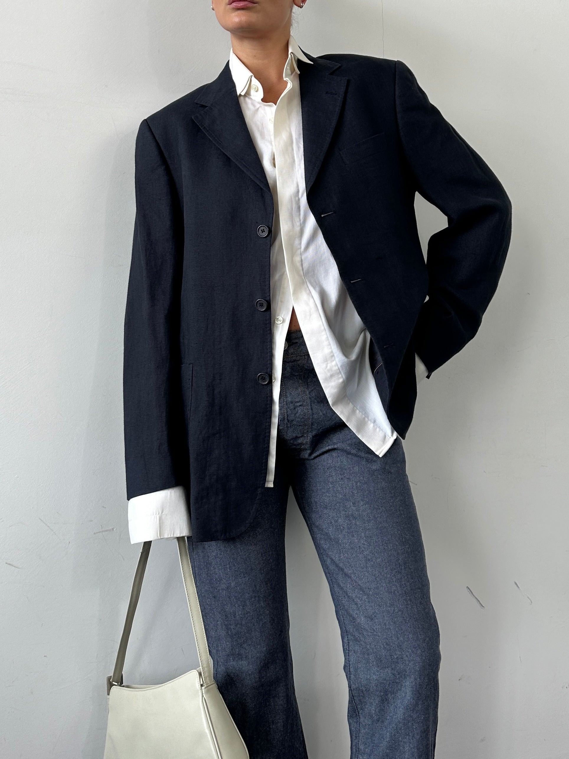 Vintage pure linen single-breasted blazer in size L, lightweight and stylish with a classic fit, showcased on a hanger.
