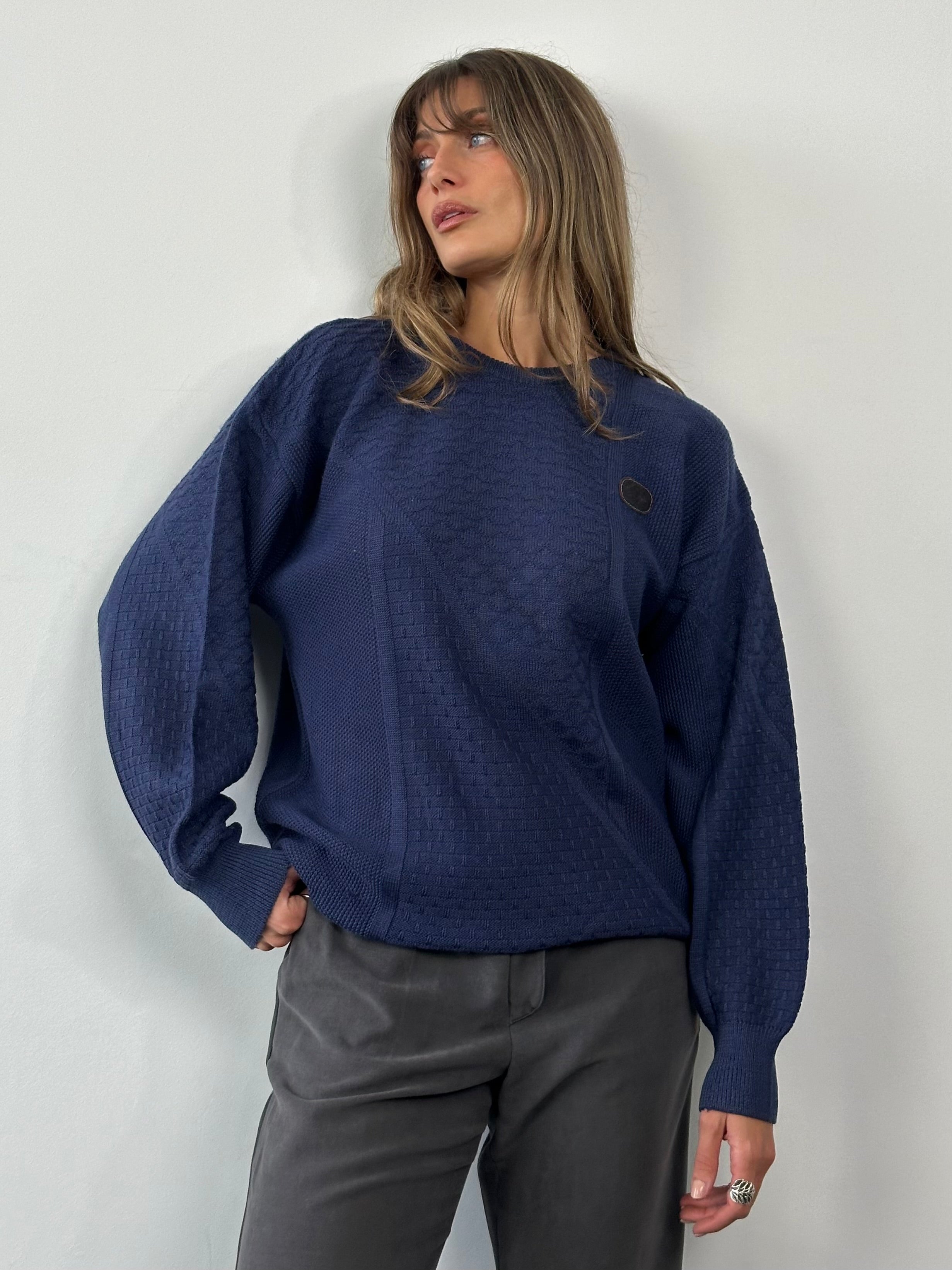 Valentino 1990s cotton cable knit logo jumper in size M/L, featuring classic knit pattern and Valentino branding on the chest.