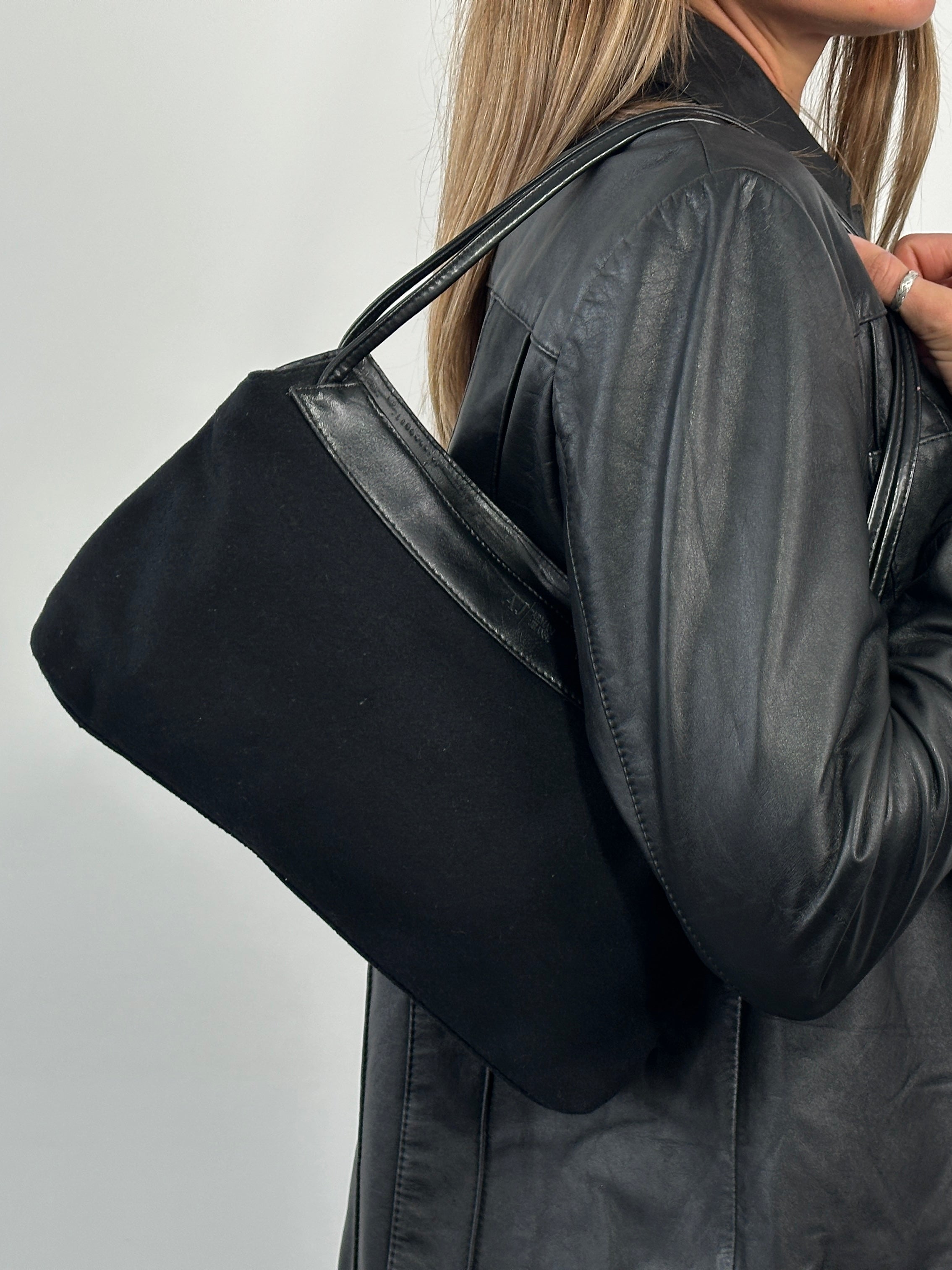 Armani Jeans 2000s wool shoulder bag with structured design and subtle branding, featuring a soft wool exterior and shoulder strap.