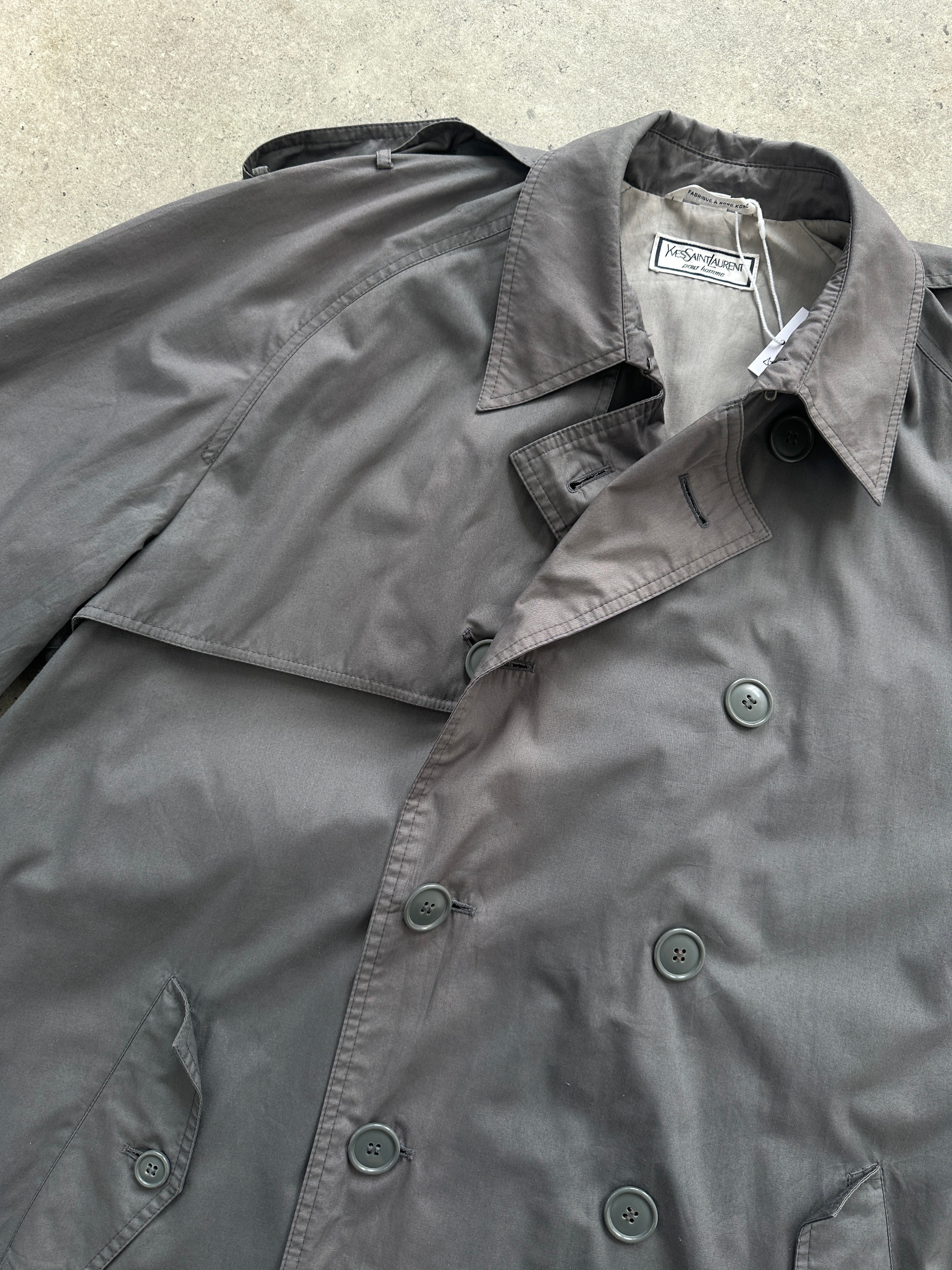 Yves Saint Laurent men's double-breasted trench coat in XL/XXL with belted waist and classic design, front view showing details.