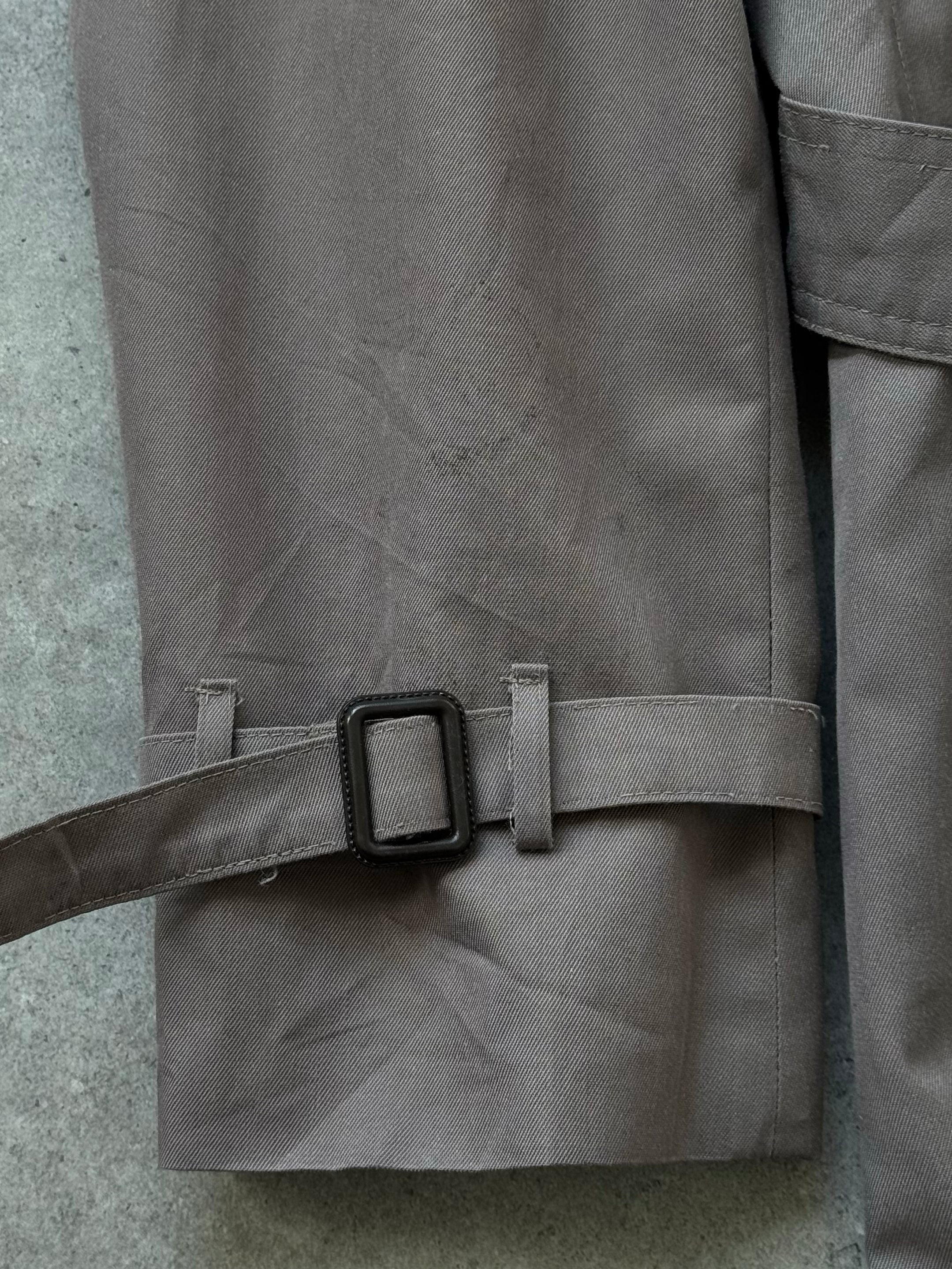 Christian Dior Monsieur 1980s double-breasted belted trench coat, classic beige coat with wide lapels and waist belt, vintage style.