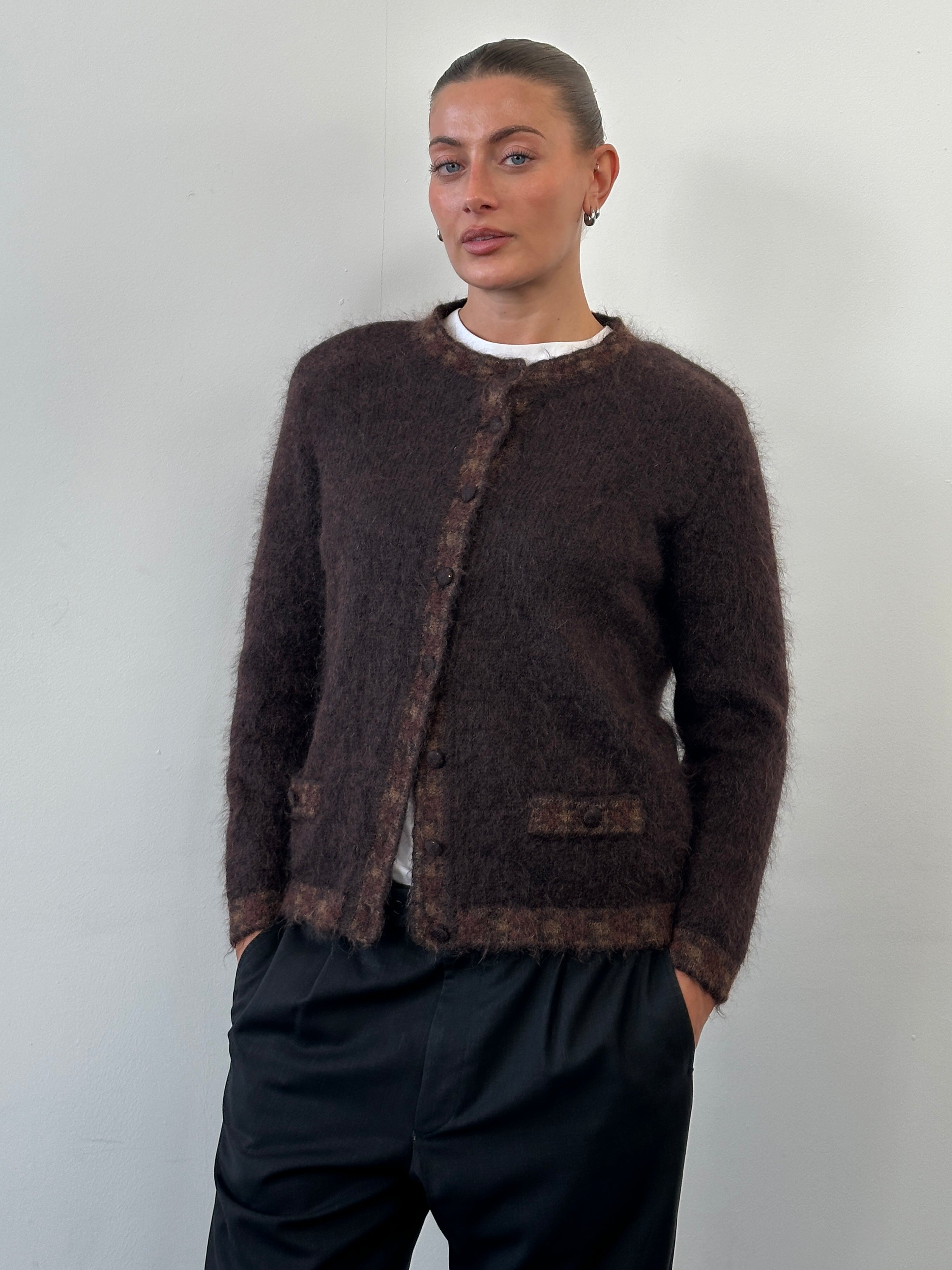 Vintage Italian 1990s mohair cardigan in size S/M, featuring a soft, textured knit with classic retro style.