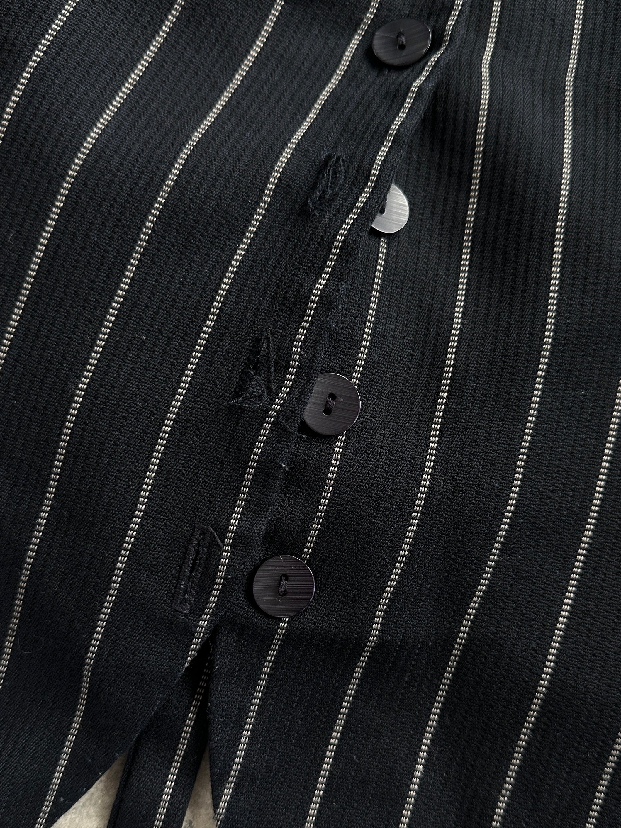 Vintage British vintage pinstripe two-piece waistcoat and trousers set, with classic tailored fit for a stylish formal look.