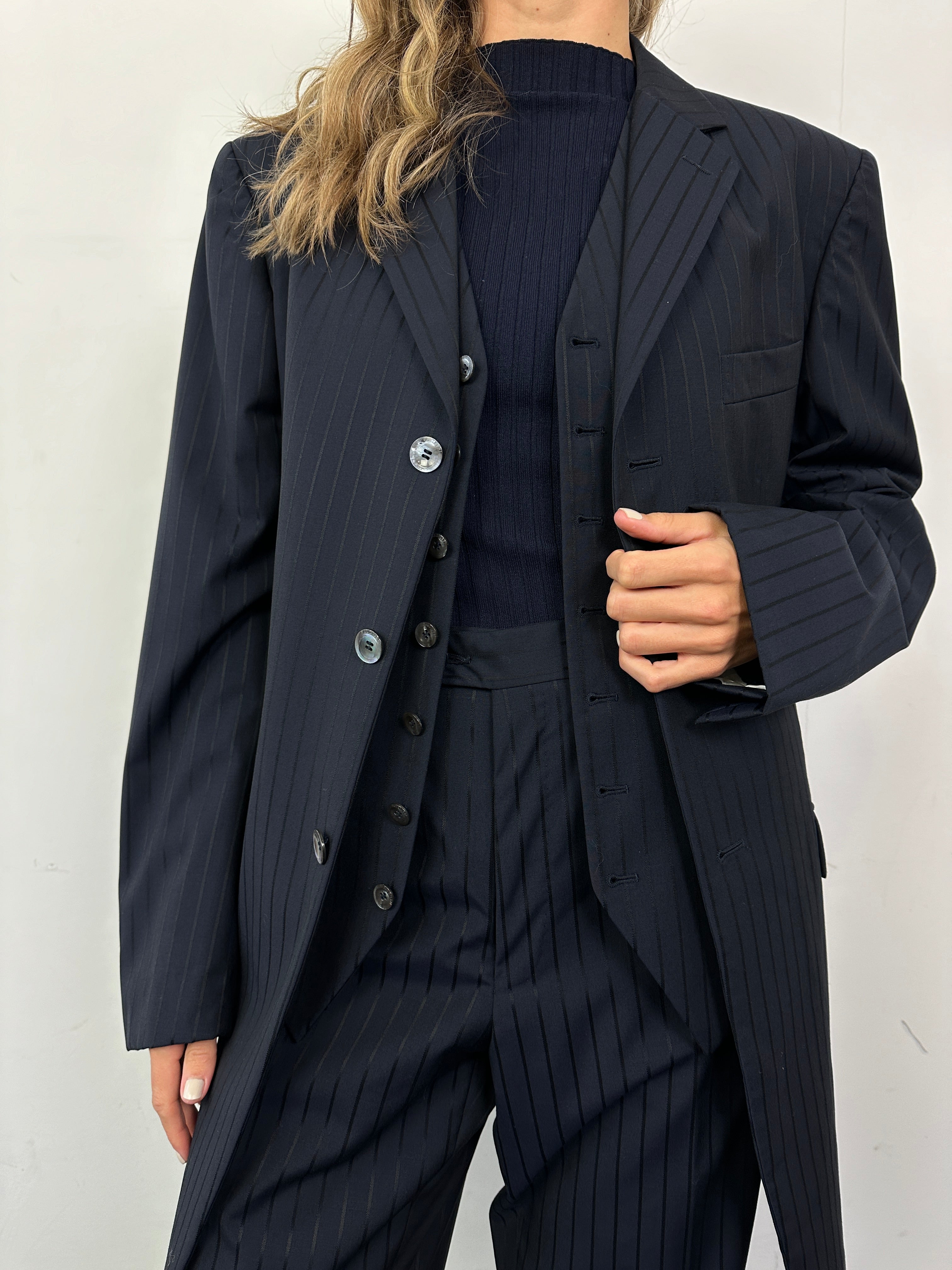 Pal Zileri pinstripe virgin wool three-piece suit in size 44R/W34, featuring a tailored jacket, vest, and matching trousers.