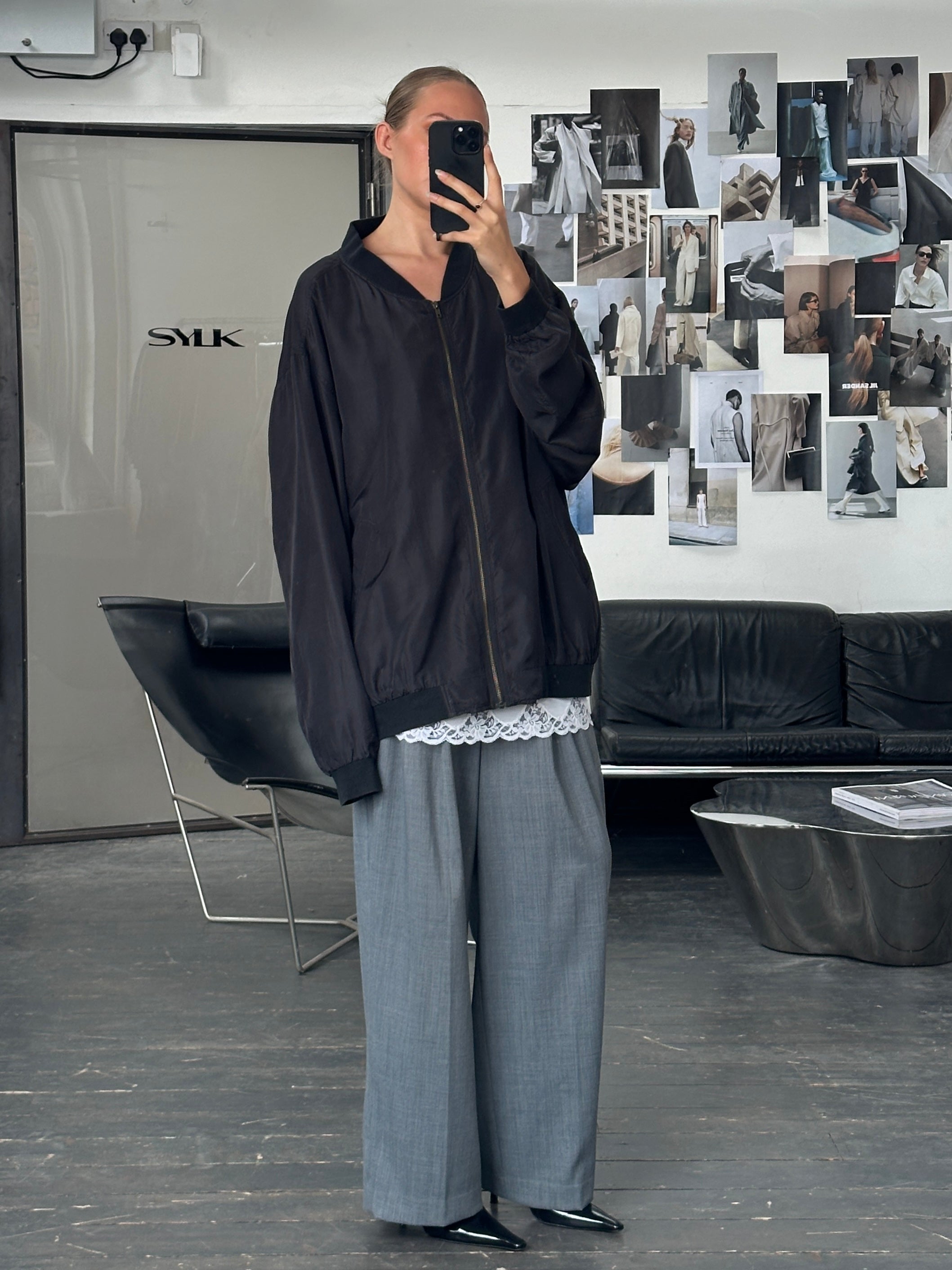 Vintage 1990s pure silk bomber jacket in XXXL size, featuring a classic design with a smooth, shiny silk fabric and ribbed collar.