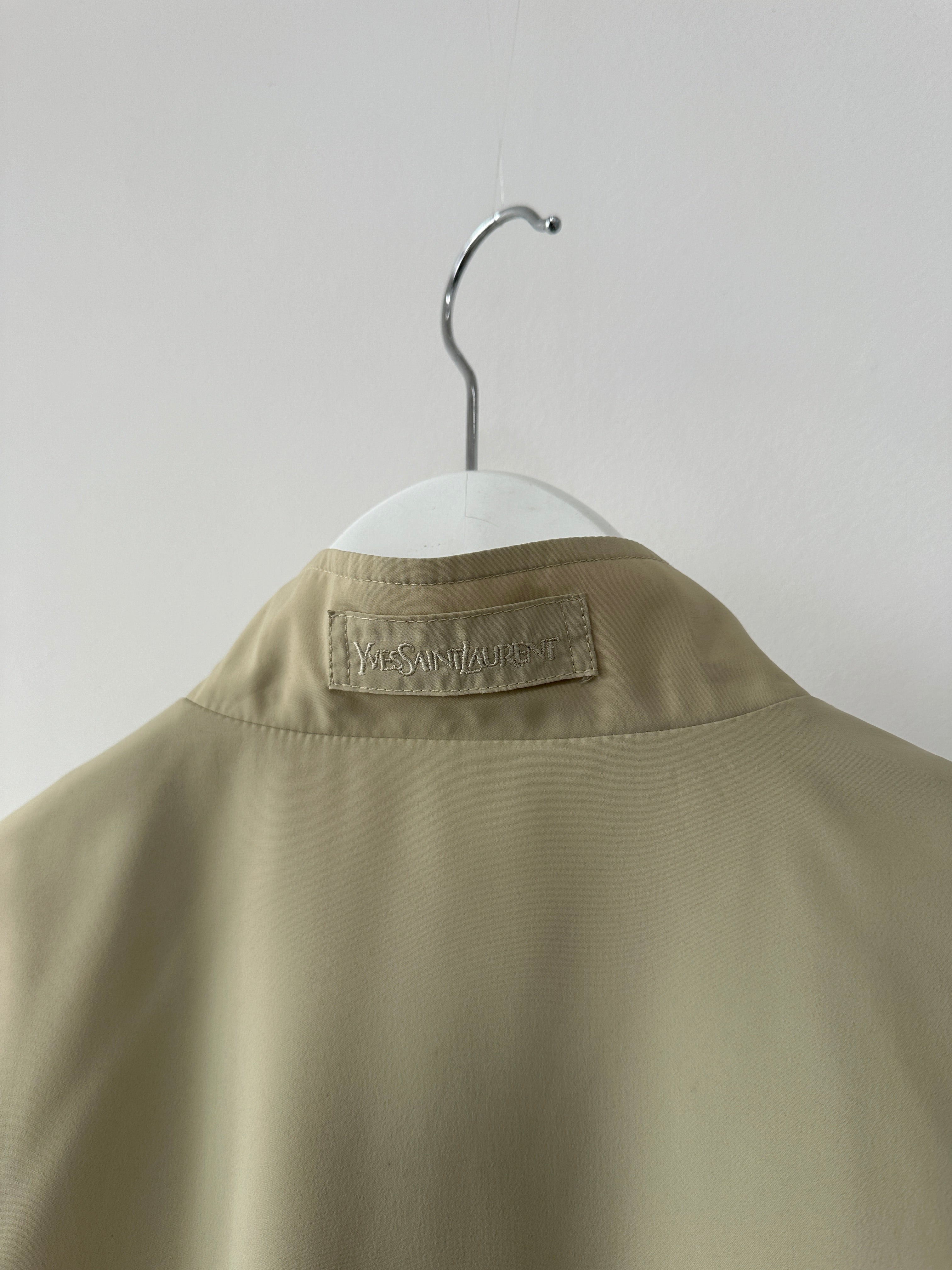 Yves Saint Laurent Pour Homme logo bomber jacket in black, front view showing the iconic YSL branding and stylish design.