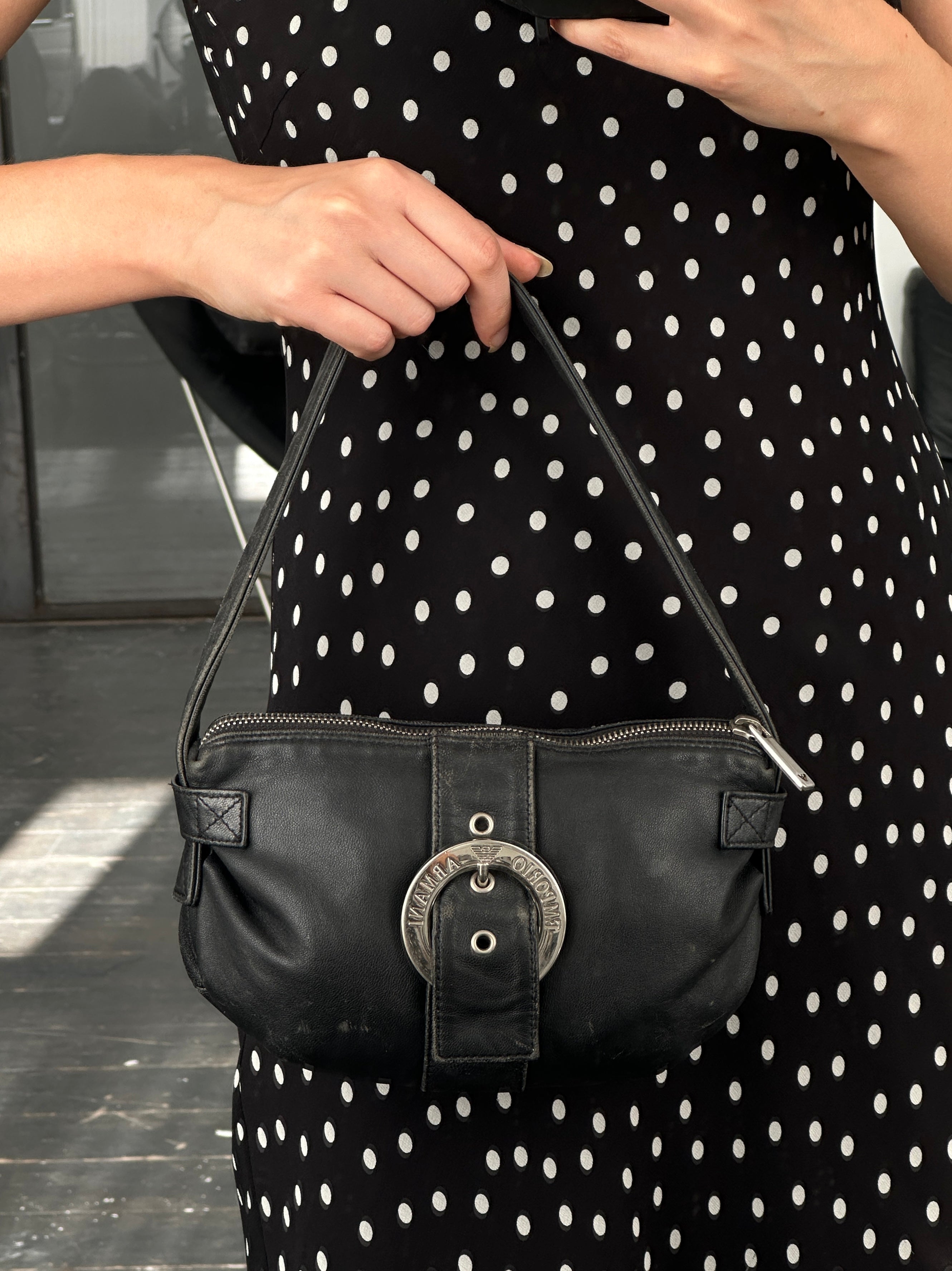 Emporio Armani 2000s aged leather shoulder bag with gold-tone hardware and adjustable strap, featuring a sleek, vintage design.