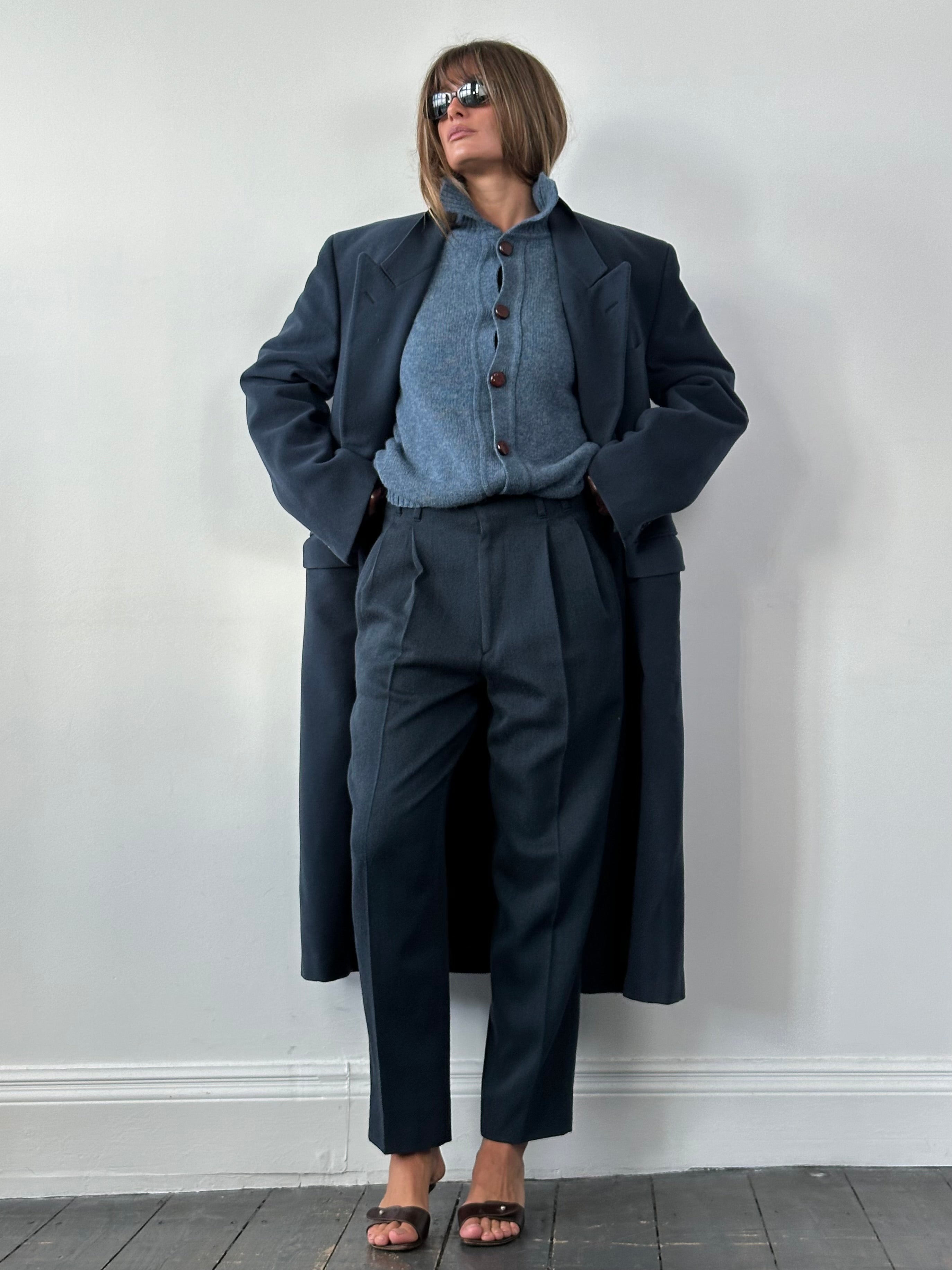 Vintage Italian pure wool high-waisted tailored trousers, W28, showcasing classic fit and elegant design in neutral tones.