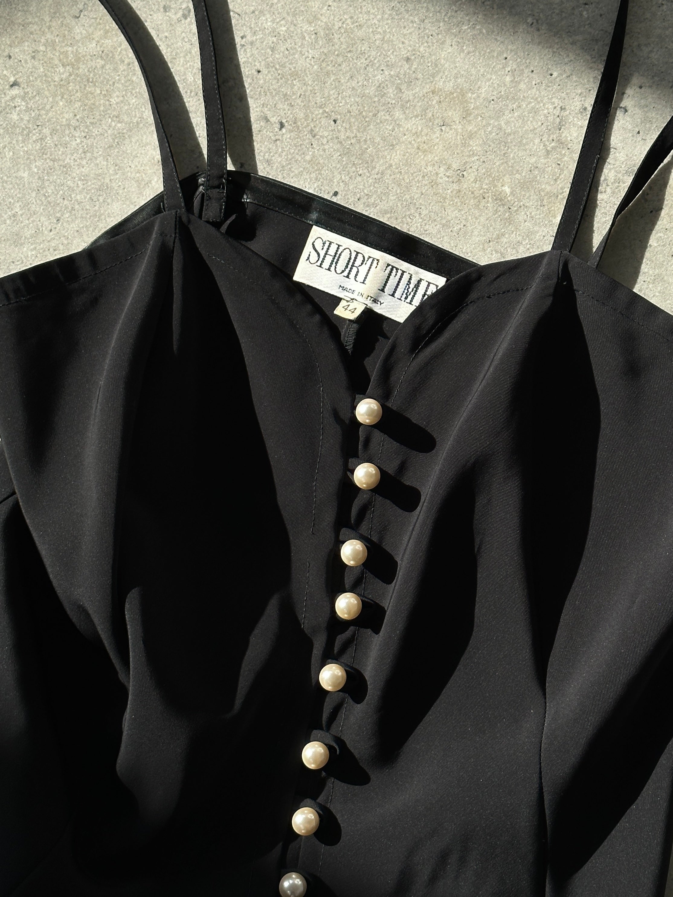 Vintage Italian vintage sweetheart neckline mini dress in size M, featuring classic elegant design and soft fabric.