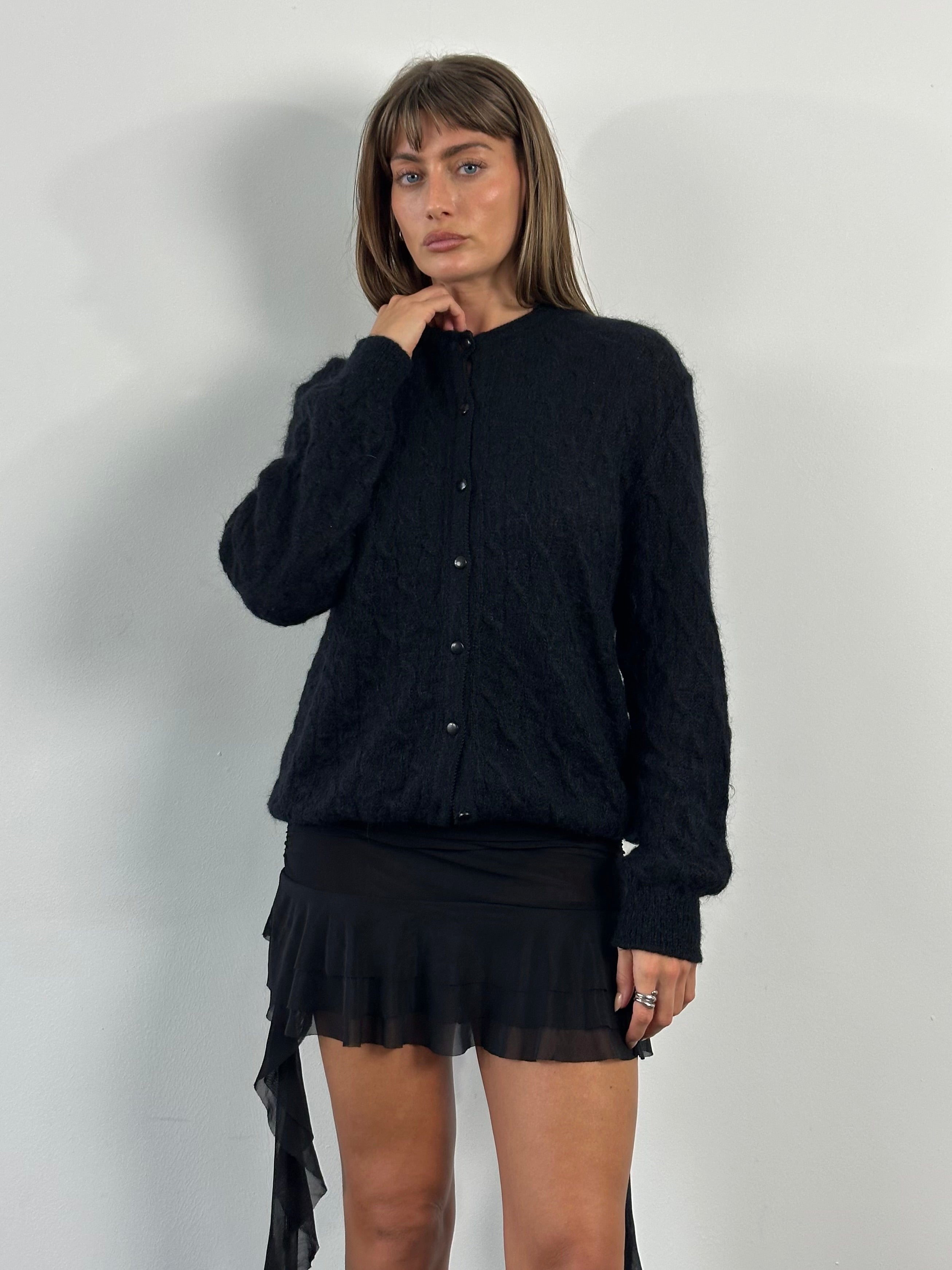 Vintage Italian 1990s mohair knitted cardigan in size M/L, featuring a soft, textured knit and classic design.