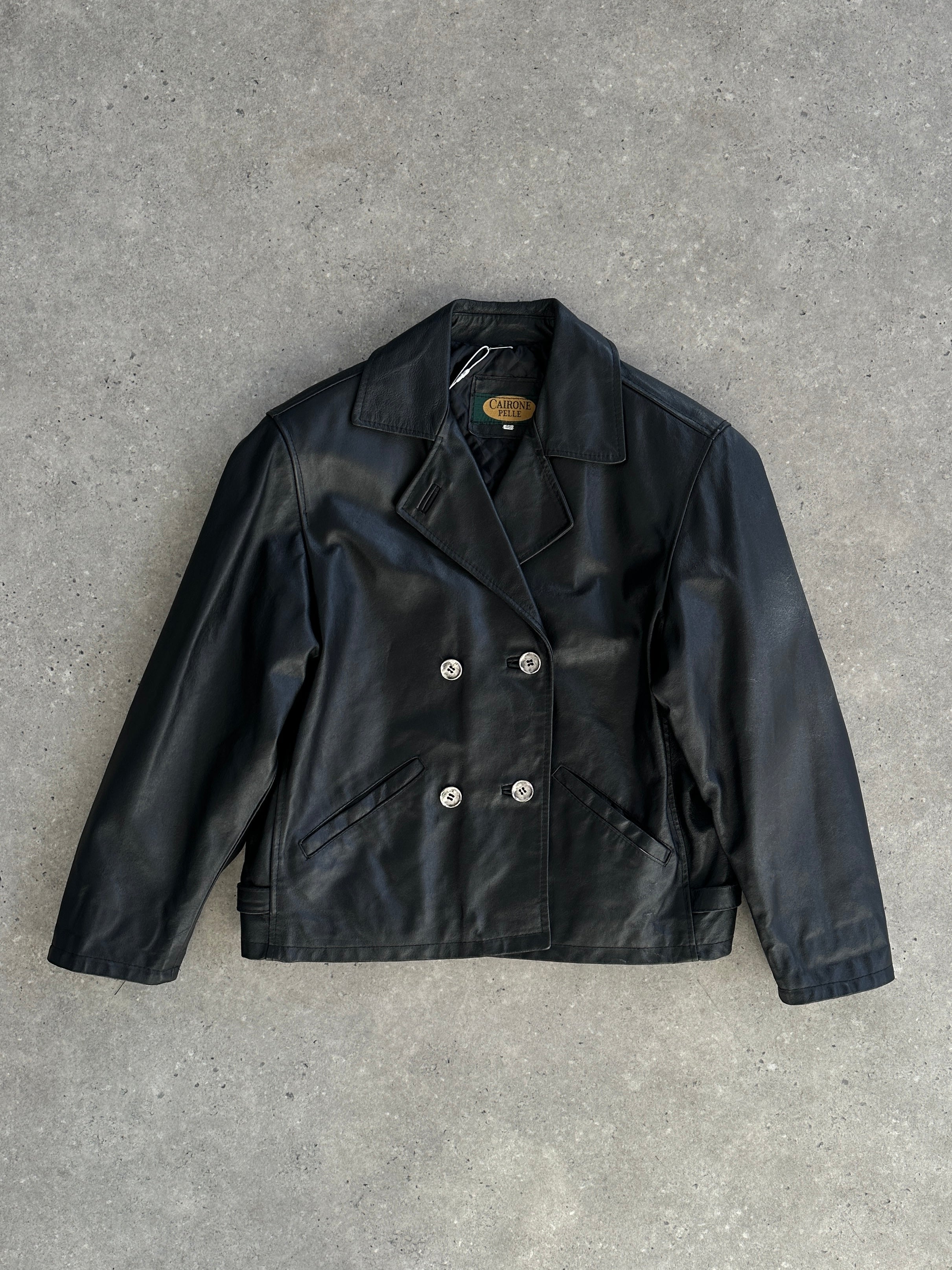 Vintage Italian vintage cropped double-breasted leather jacket, stylish M-sized jacket with classic design and textured leather.